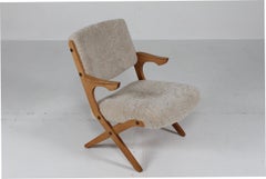 Danish Lounge Chair of Solid Oak with New Sheepskin. Danish Modern 1960s