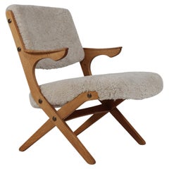 Danish Lounge Chair of Solid Oak with New Sheepskin. Danish Modern 1960s