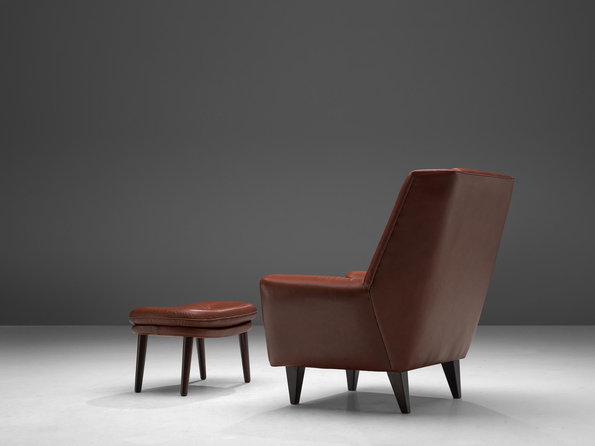 Scandinavian Modern Danish Lounge Chair with Ottoman in Brown Cognac Leather, circa 1960
