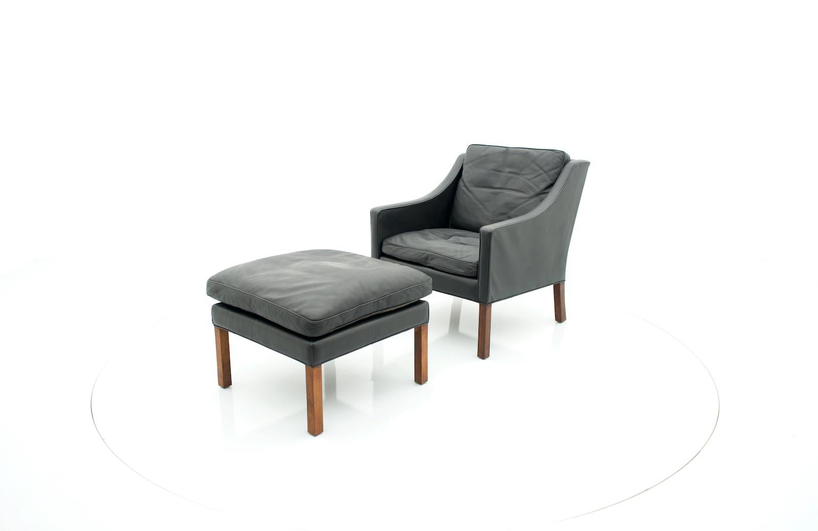 Danish Vintage Lounge Chair with Stool in Black Leather 1960s For Sale 2
