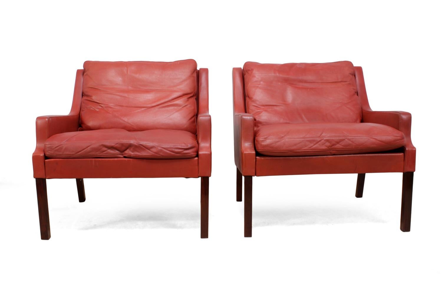 Danish Lounge Chairs in Red Leather with Stools In Excellent Condition For Sale In Paddock Wood, Kent