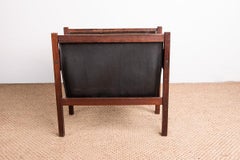 Danish magazine rack in rosewood and leather, 1960.