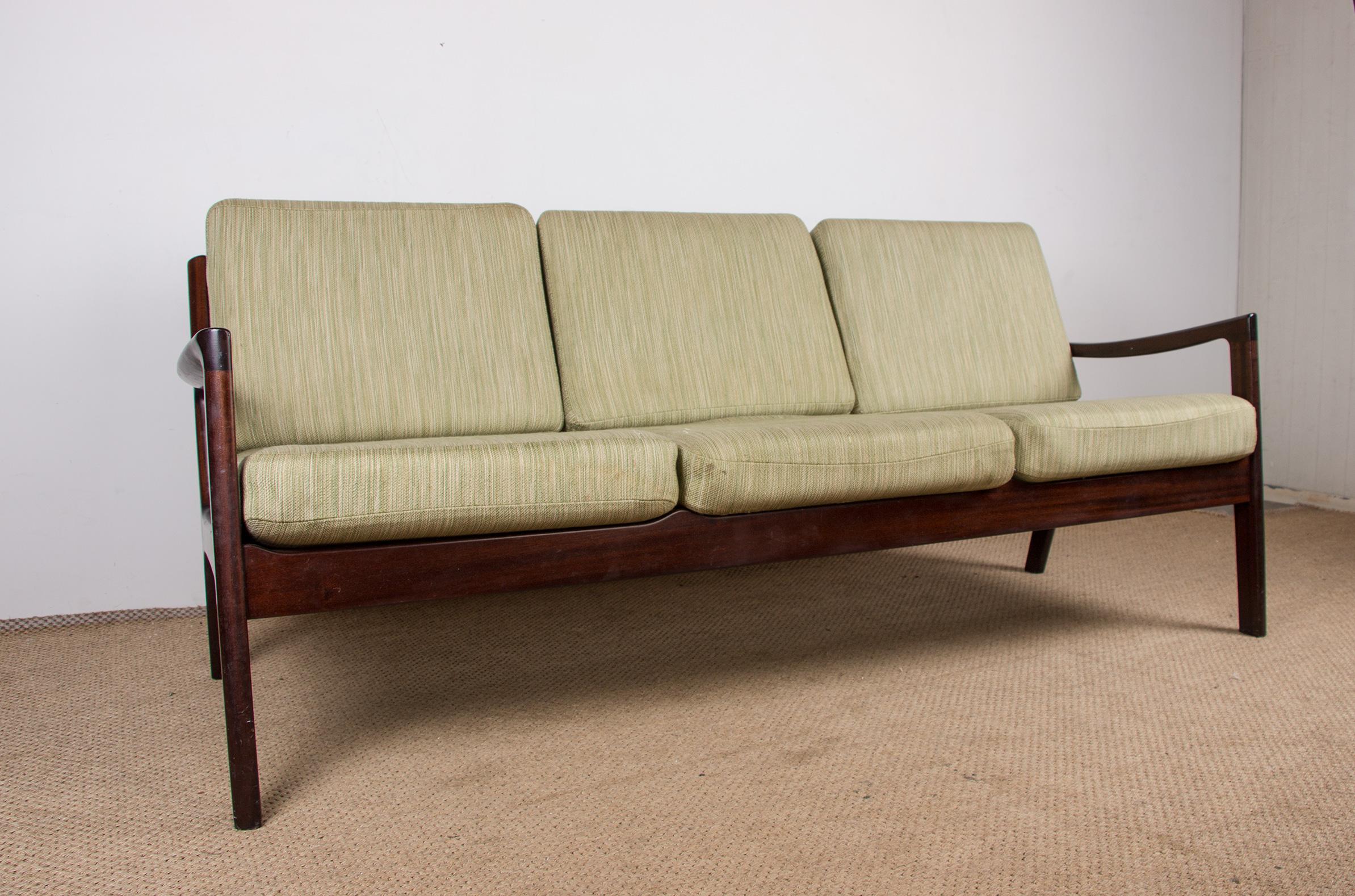 Superb Scandinavian sofa. Structure in solid mahogany, seats and cushions in fabric, very comfortable. Sober and very elegant design. Very good build quality. Furniture listed on the Design Museum Denmark website under number RP 02697.