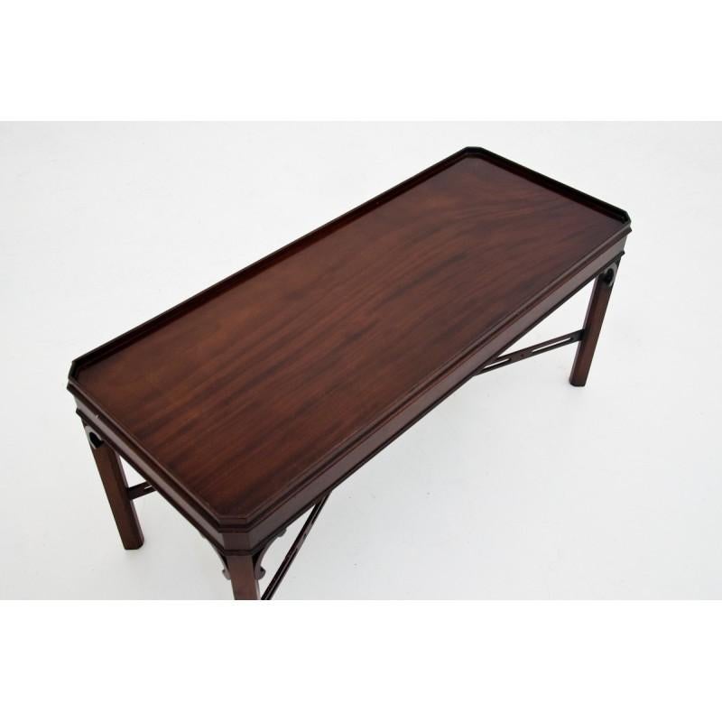 An elegant, mahogany coffee table from Denmark, from circa 1960s.
Minimal and simple form.
Beautiful rosewood condition.
 