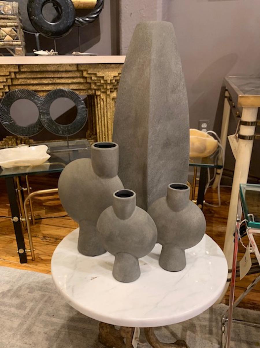tall grey vase