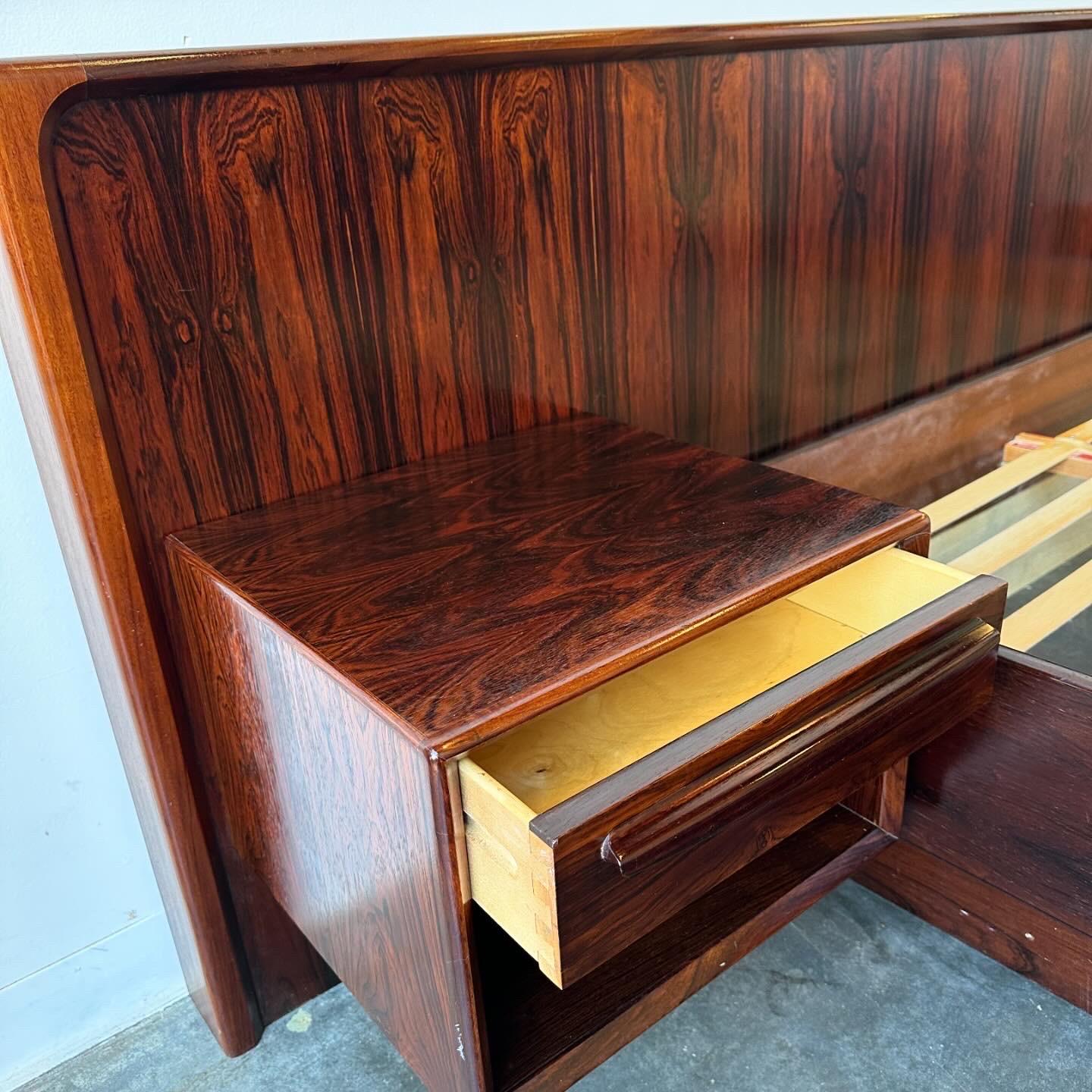 Danish Mid Century Modern Rosewood Queen Size Platform Bed with floating nightstands.

Stunning set in excellent condition by Westofa circa 1970.

Dimensions:
101 1/2” W
63” W
85” L 
15 1/2” bed height 
33 1/2” headboard height