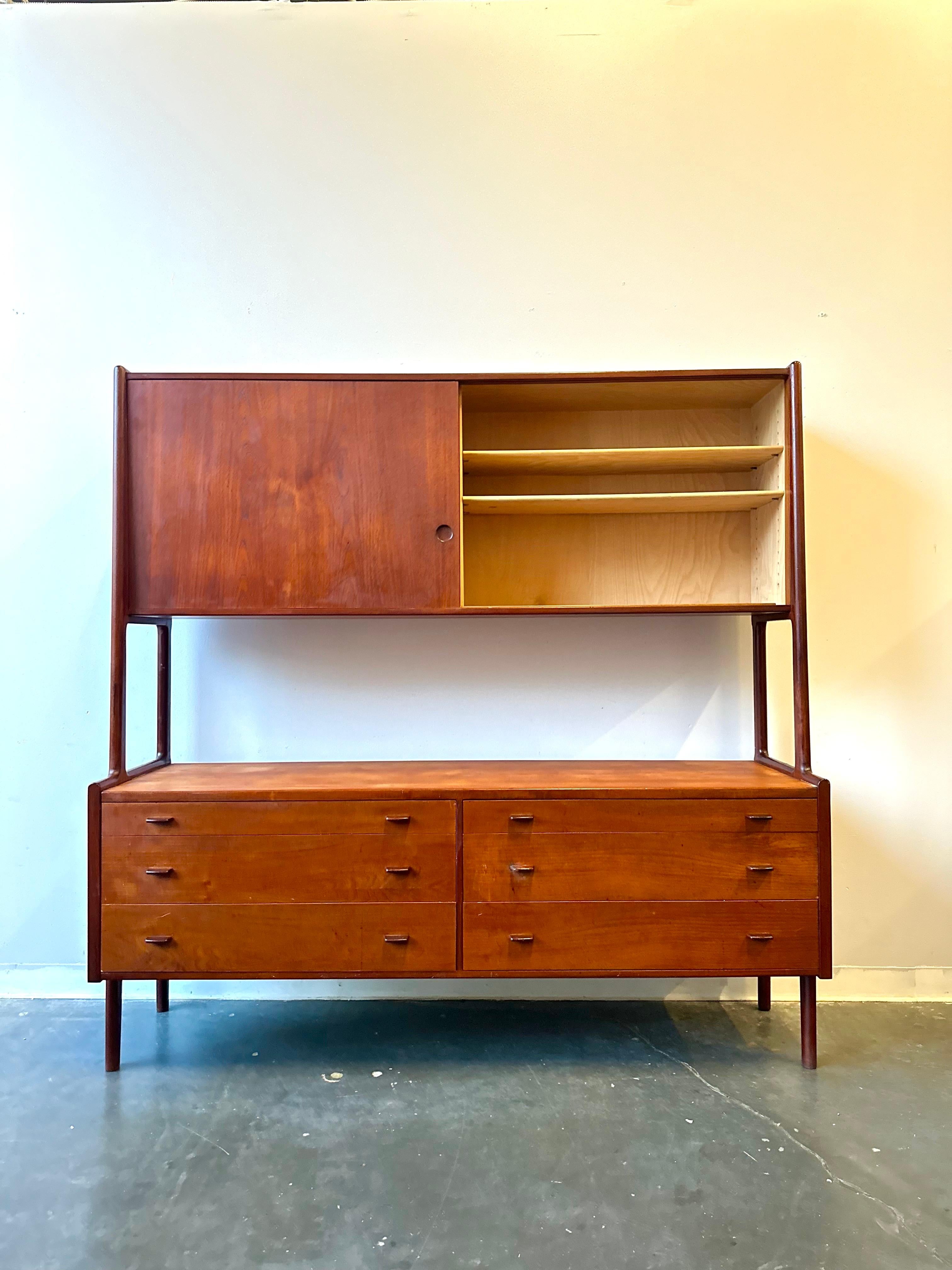 Hans J. Wegner RY-20 Teak Credenza with Glass Doors for Ry Mobler 

This phenomenal collectors piece is in great shape.   Featuring six drawers on bottom , adjustable shelves up top, with sliding  doors 

Minimal wear, this hutch shows very