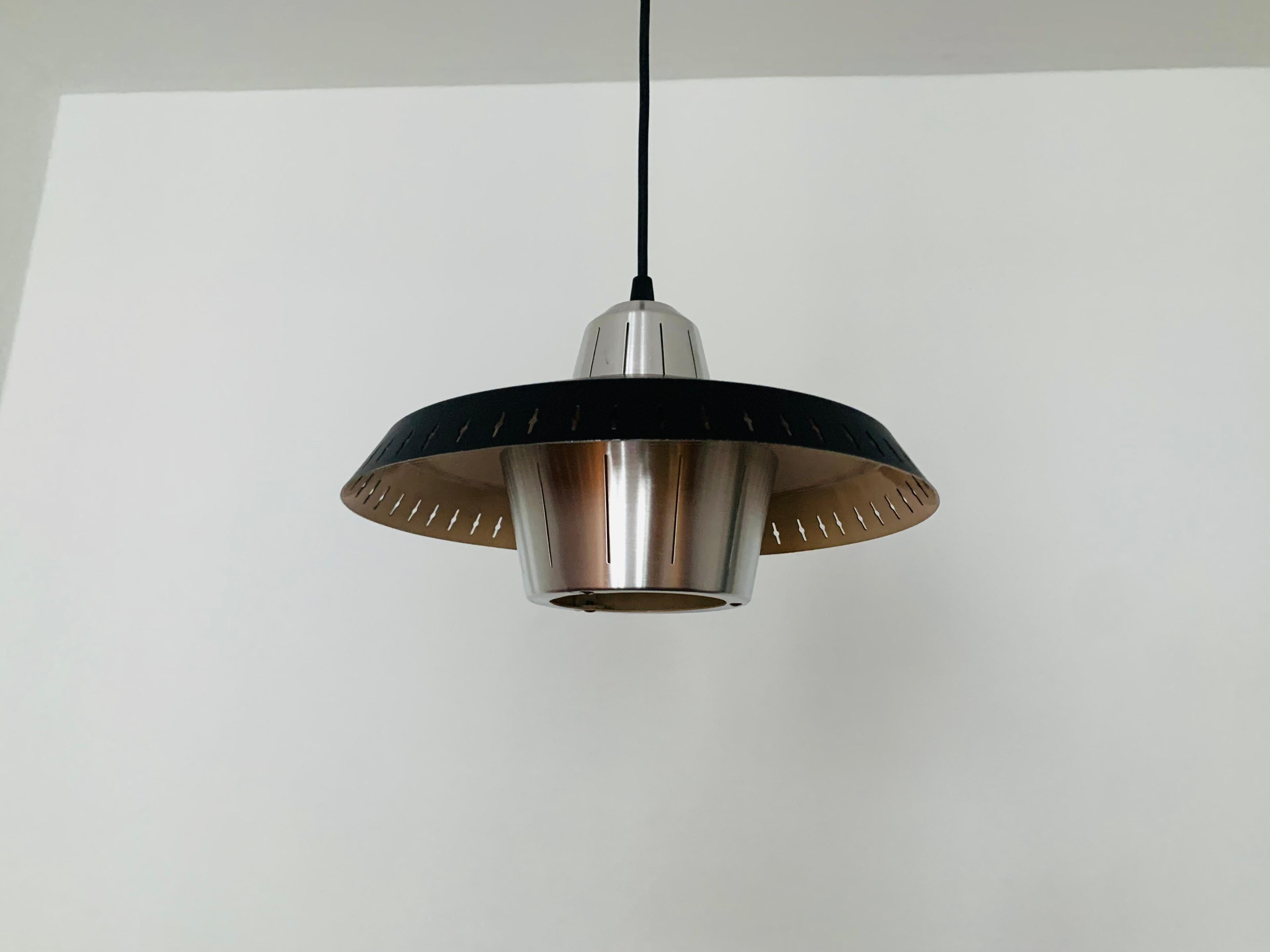 Very beautiful and rare Danish pendant lamp from the 1960s.
The design and the appearance of the lamp is particularly beautiful.
The shape creates a wonderful light.

Condition:

Very good vintage condition with slight signs of wear consistent
