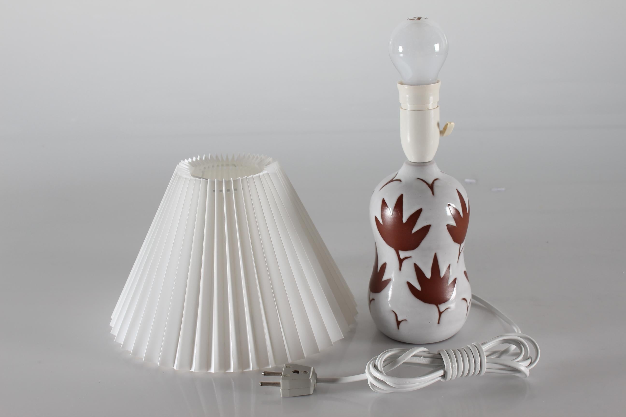 Mid-Century Modern Danish Ceramic Table Lamp with White Glaze and Brown Leaf Pattern 1950s