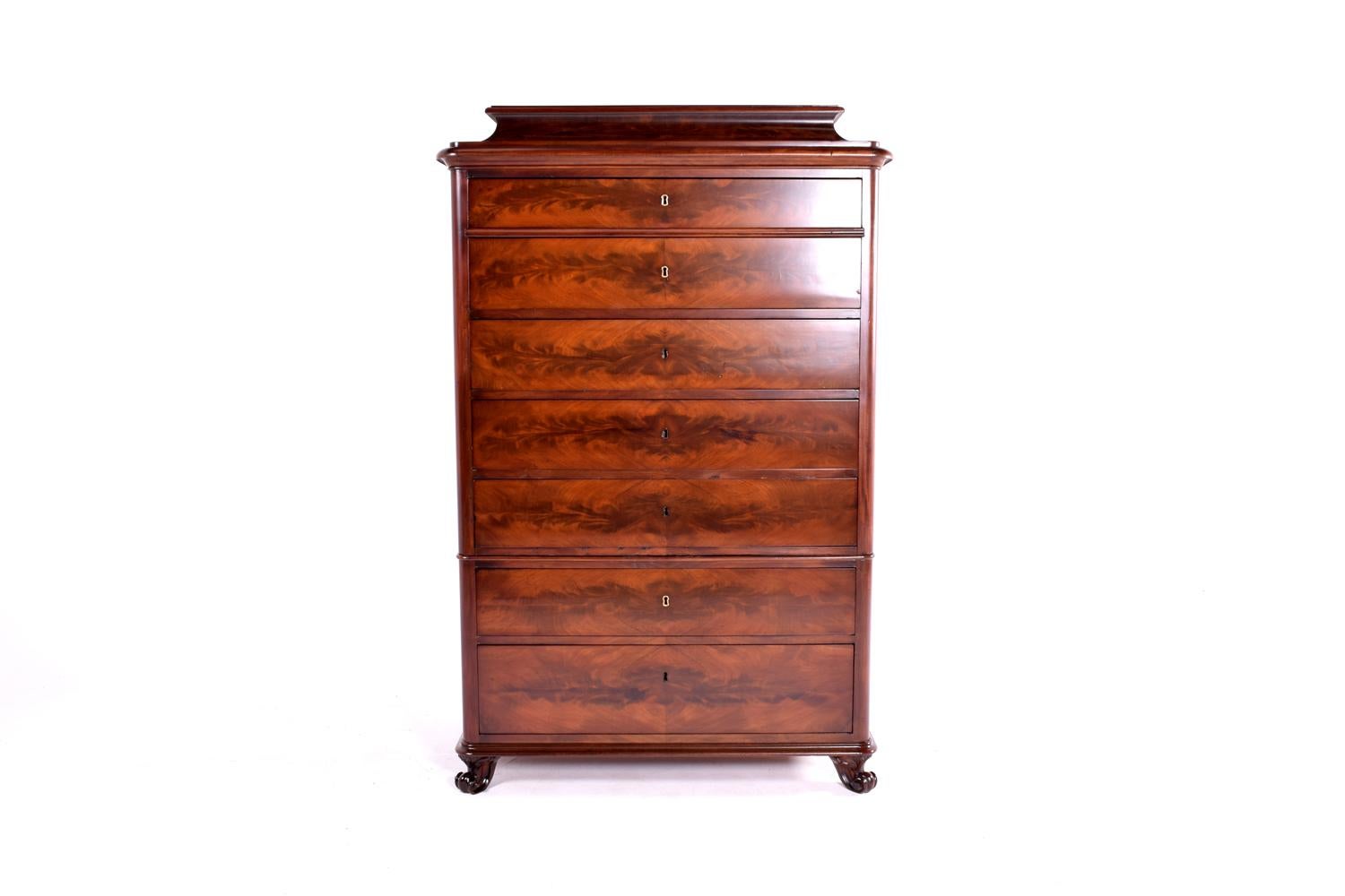 Mahogany flame veneer Danish Biedermeier Tallboy chest of drawers, form the 1850s-1960s.
With seven drawers, presumably one for each day of the week - 
