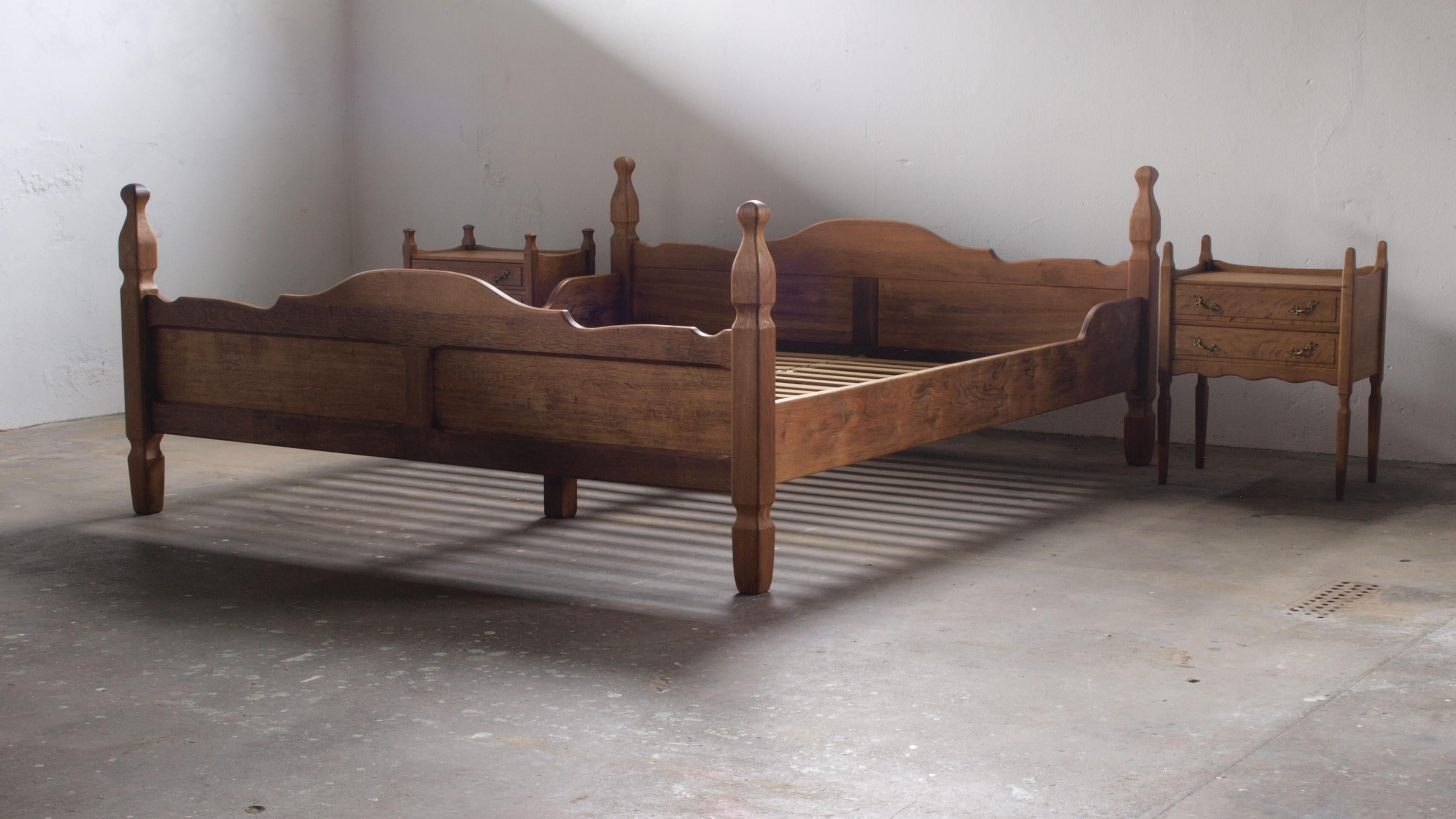 A rare double bed in solid oak. Design attributed Henning Kjærnulf for EG Møbler, Denmark, made around the 1960s. A sculptural piece that combines Baroque style and modernism.

Measure 39cm(15.35inch) from floor to the top of the surface of the