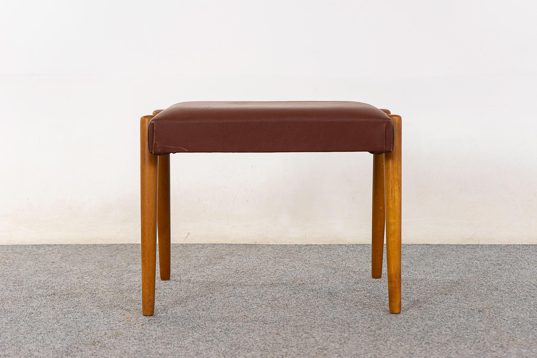 Beech footstool, circa 1960's. Unique splayed legs & original upholstery with minor wear.