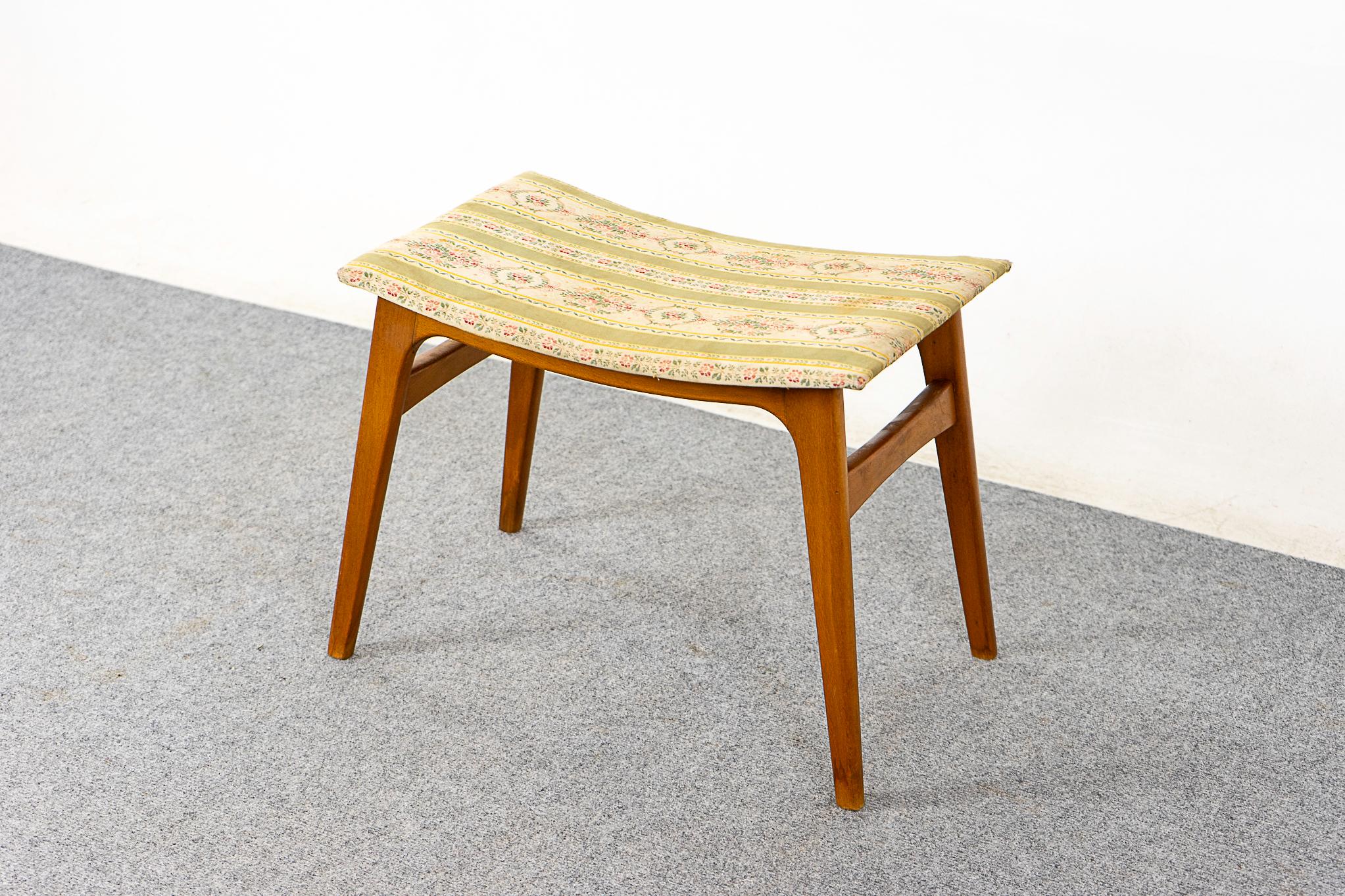 Beech Danish footstool, circa 1960's. Splayed tapering legs, cross supports and original upholstery with wear.