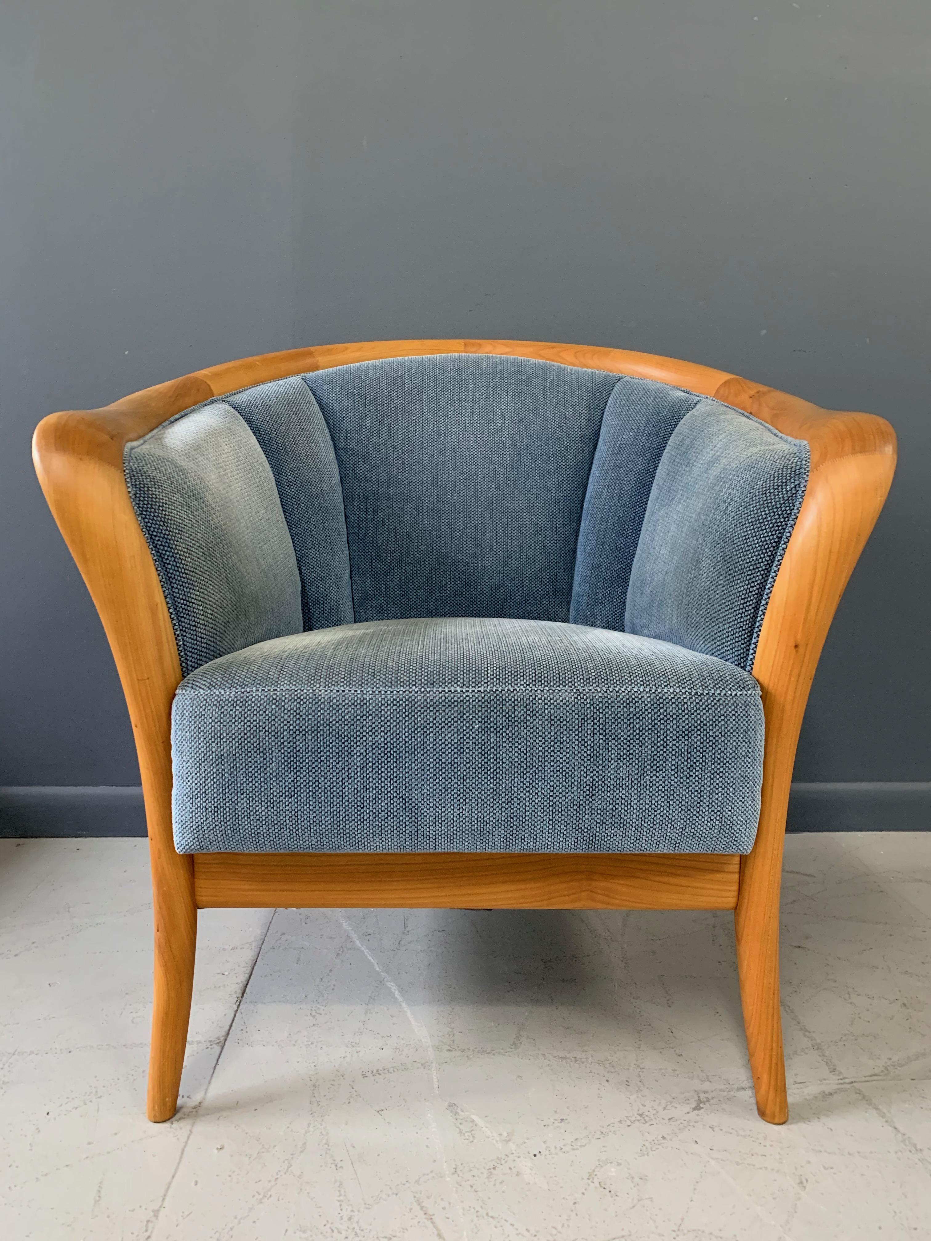 This lovely armchair with its gracefully curved arms and expert joinery is not only a delight to look at but also to sit in.

Please see our other listings for the matching sofa.

  