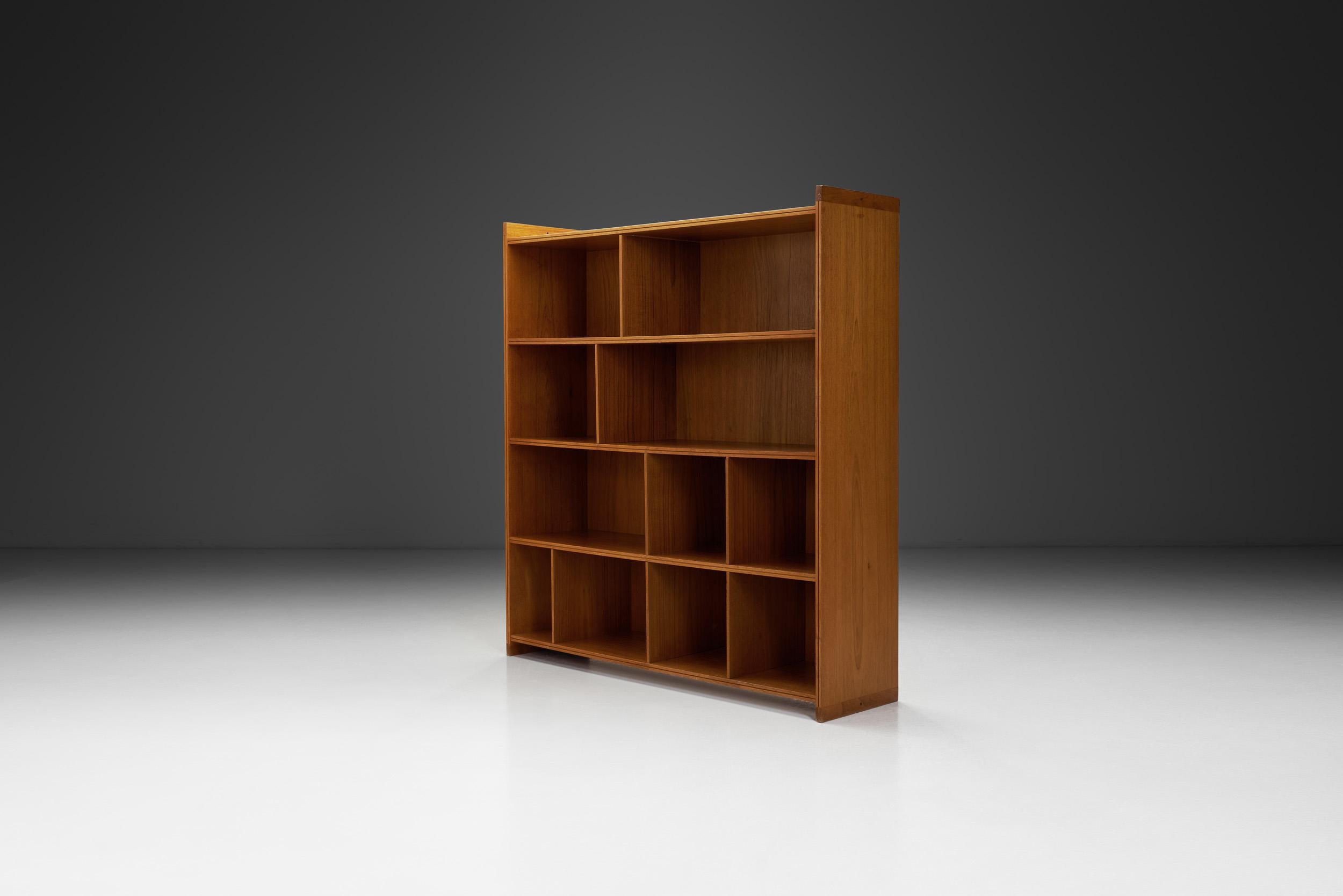This lovely bookcase designed by Grete Jalk for P. Jeppesen reflects the Danish designer’s aesthetic—clean and highly functional, yet creative.

Danish mid-century pieces were often created with a functional purpose in mind, rather than decorative,