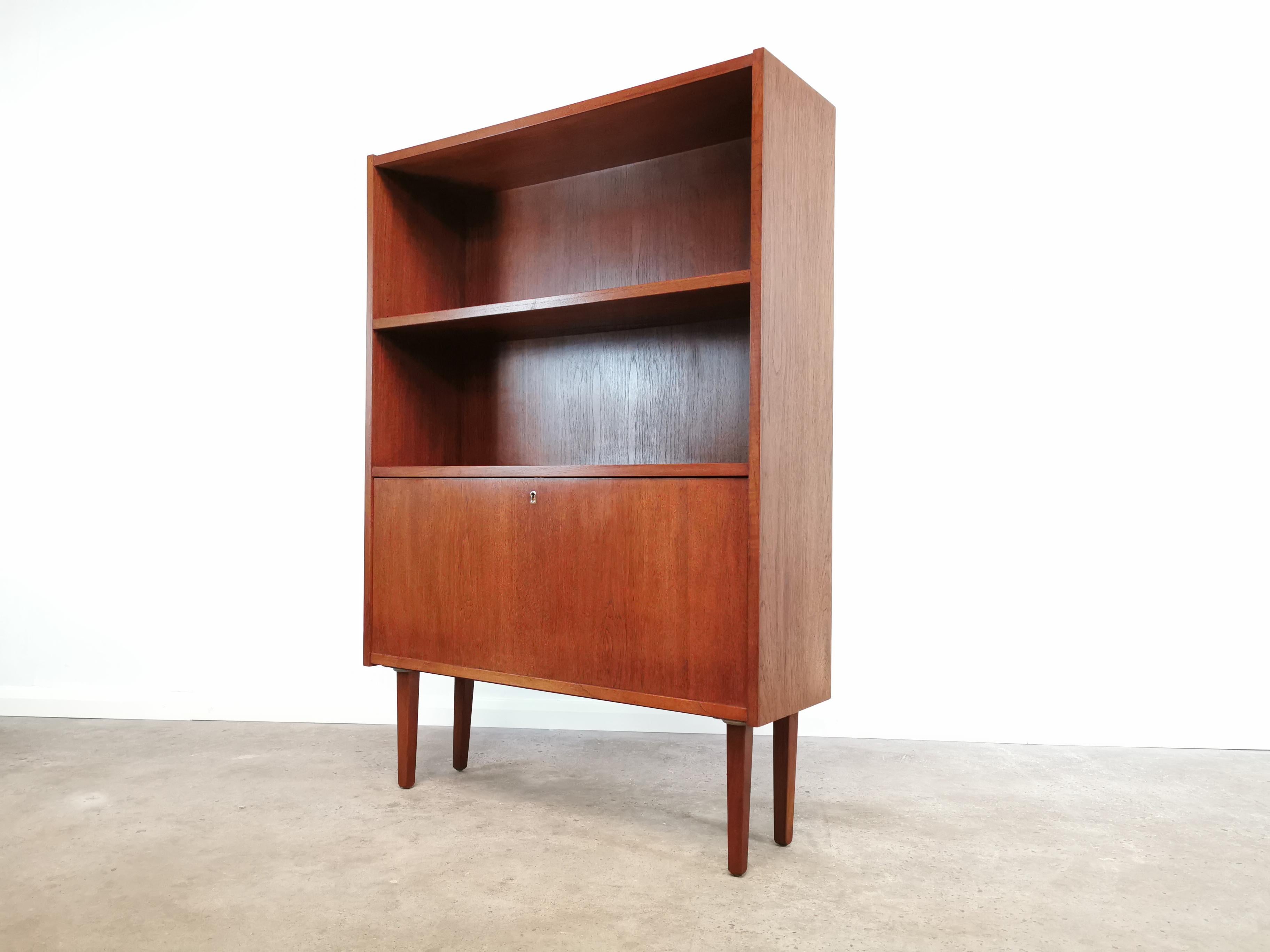 Danish bookcase cabinet from the mid-century. 

Features two shelves and a drop front lockable cupboard. 