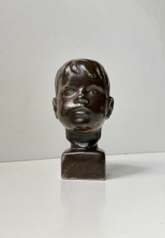 Danish Mid-Century Boy Bust in Black Glazed Ceramic, Johgus, 1950s