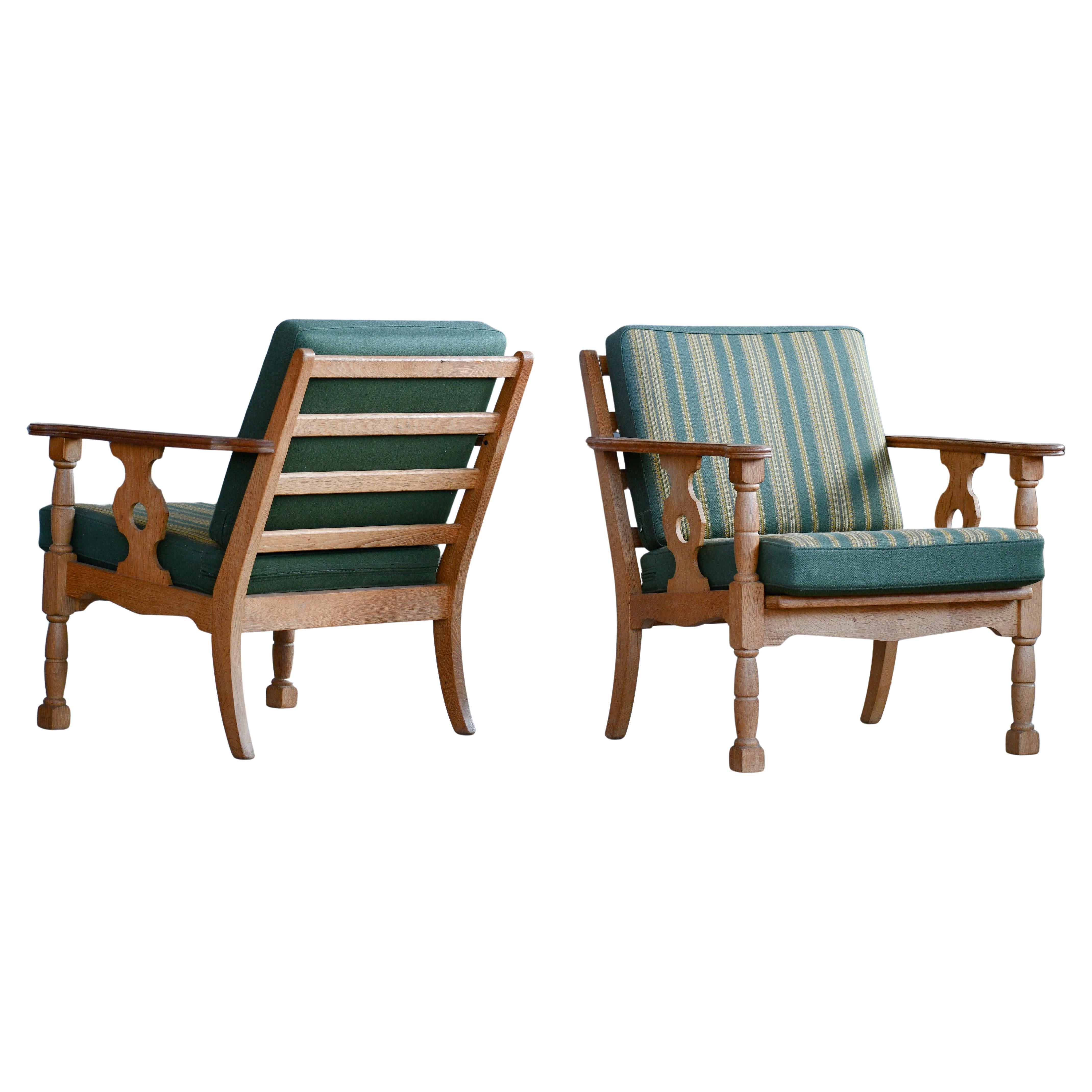 Danish Mid-Century Carved Oak Easy Chairs in Oak by Henry Kjaernulf, 1960's