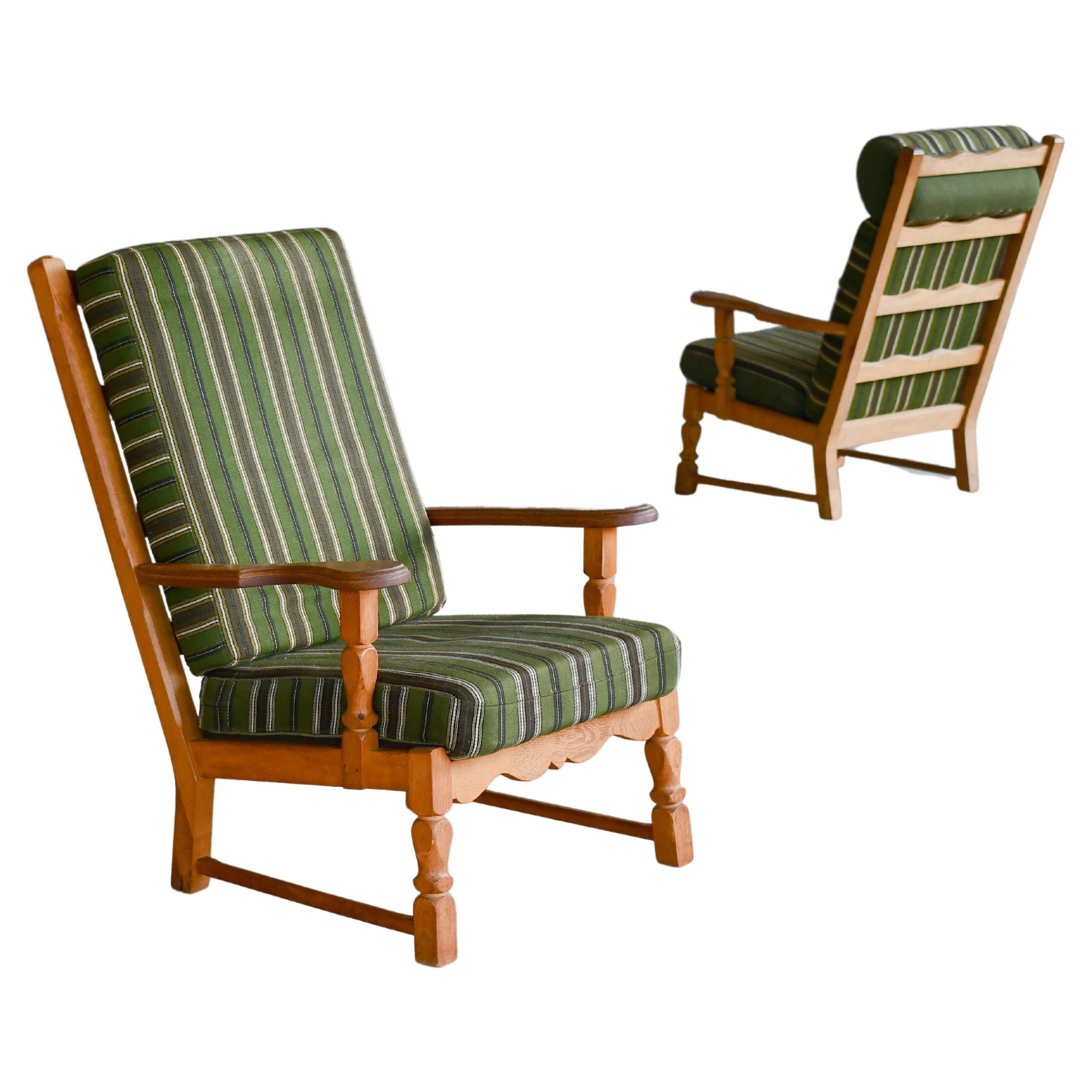 Danish Mid-Century Carved Oak Lounge Chairs in Oak by Kjaernulf, 1960's For Sale