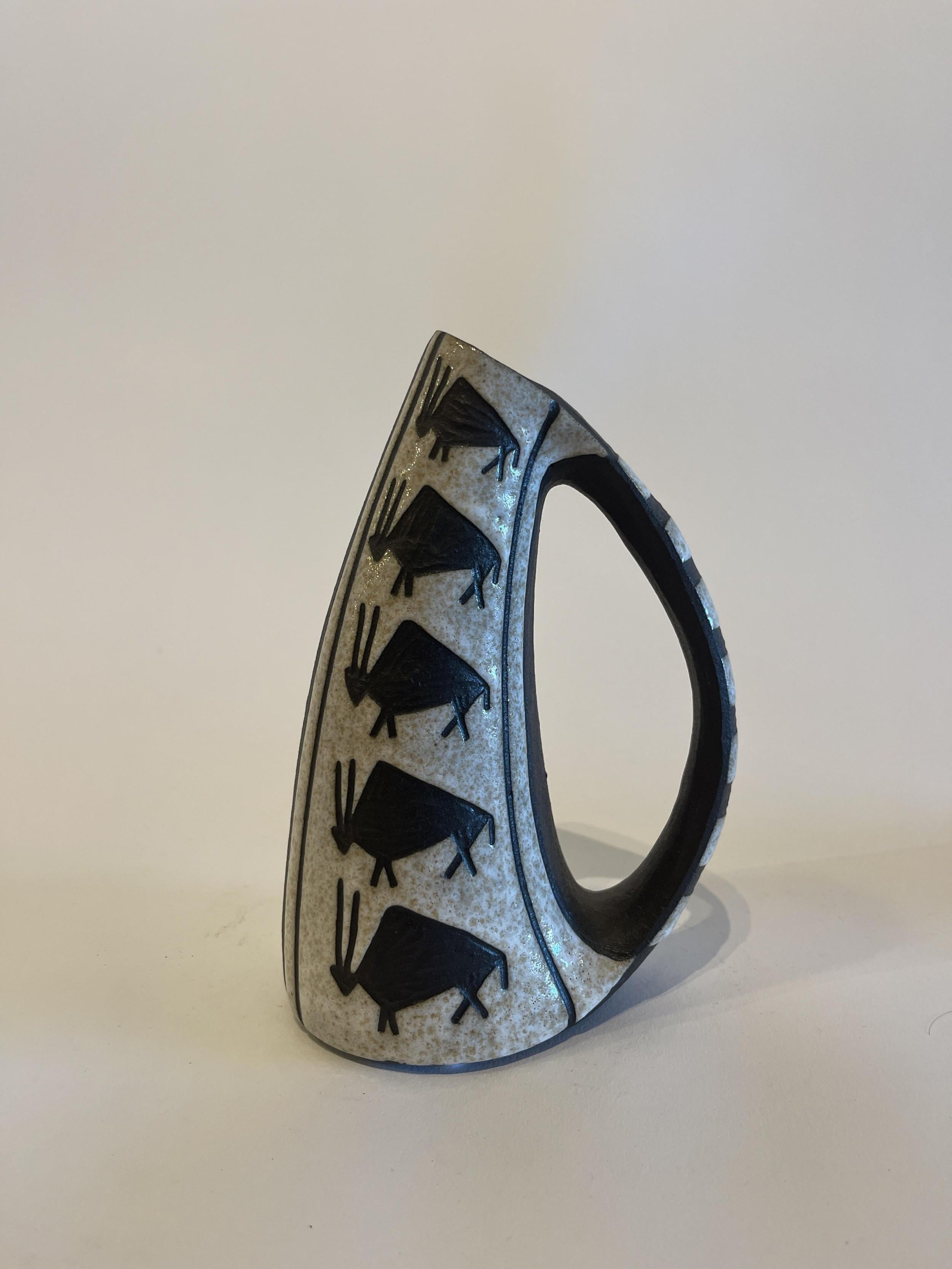 Danish Mid-Century Ceramic Pitcher with a large handle and decorated wtih 5 bulls, Marianne Starck for Andersen and Sons (companion pieces REG4517A-G)