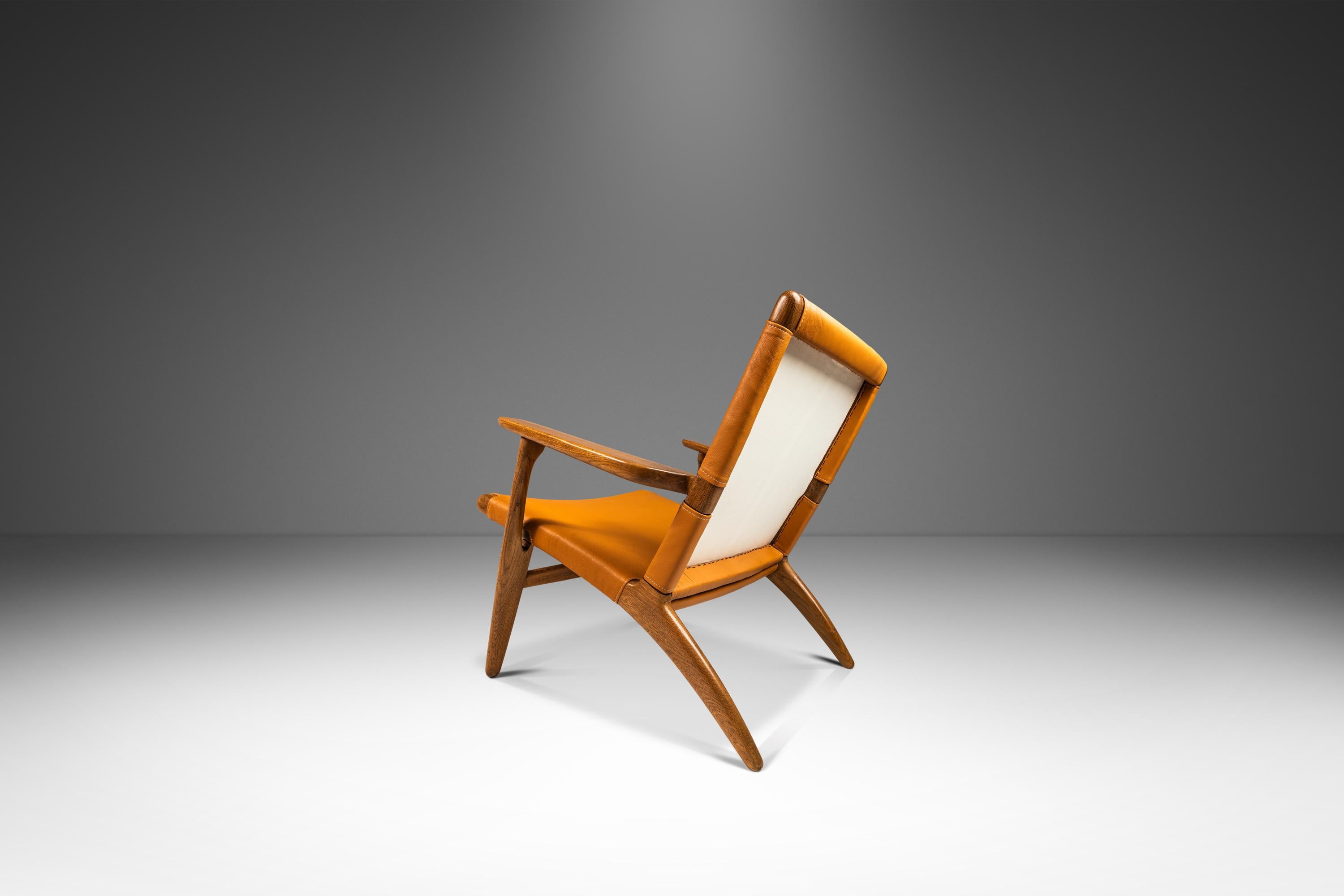 Mid-20th Century  Danish Mid-Century CH 25 Lounge Chair by Hans J. Wegner, Oak & Leather, c. 1950 For Sale
