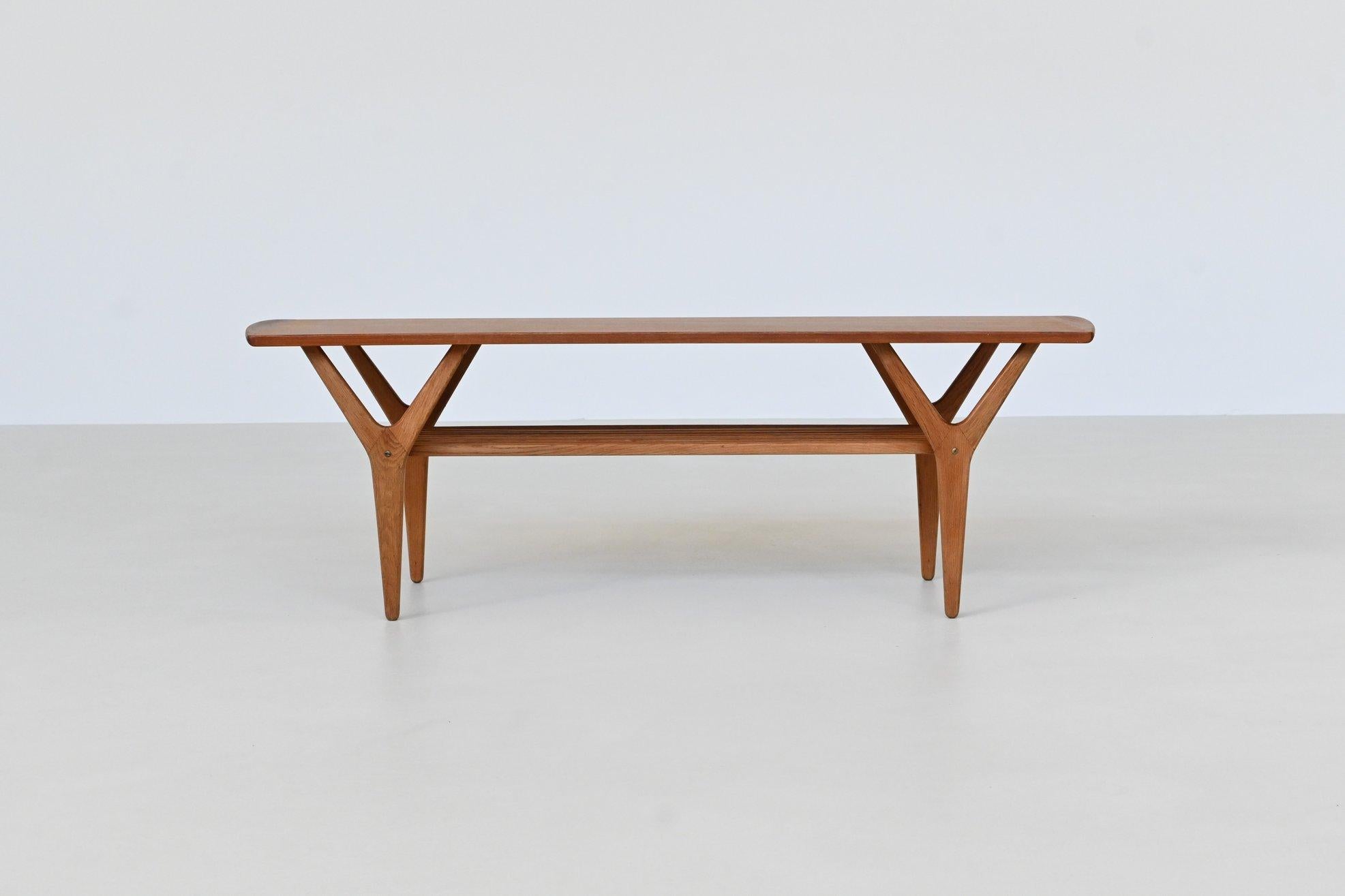 Beautiful shaped Danish coffee table designed in the style of Kurt Østervig, Denmark 1960. This striking coffee table embodies the organic and sculptural design language of Kurt Østervig, a celebrated Danish designer from the mid-century era.