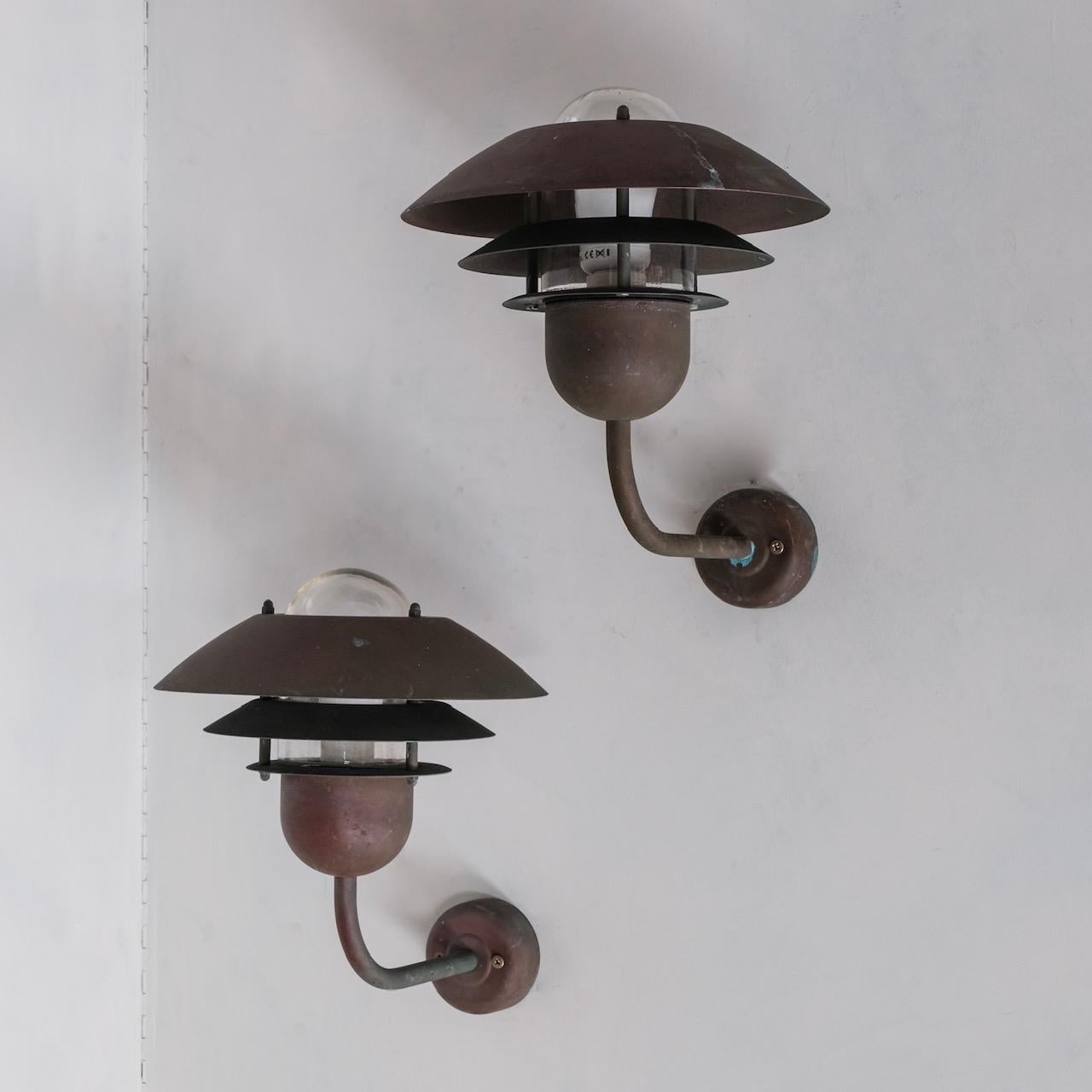 A naturally patinated copper wall light, with glass inner bulb shade. 

Denmark, c1990s. 

Good vintage condition. 

Originally designed for outside use but ideal for internal use. We cannot guarantee outside usage as it is a vintage piece.