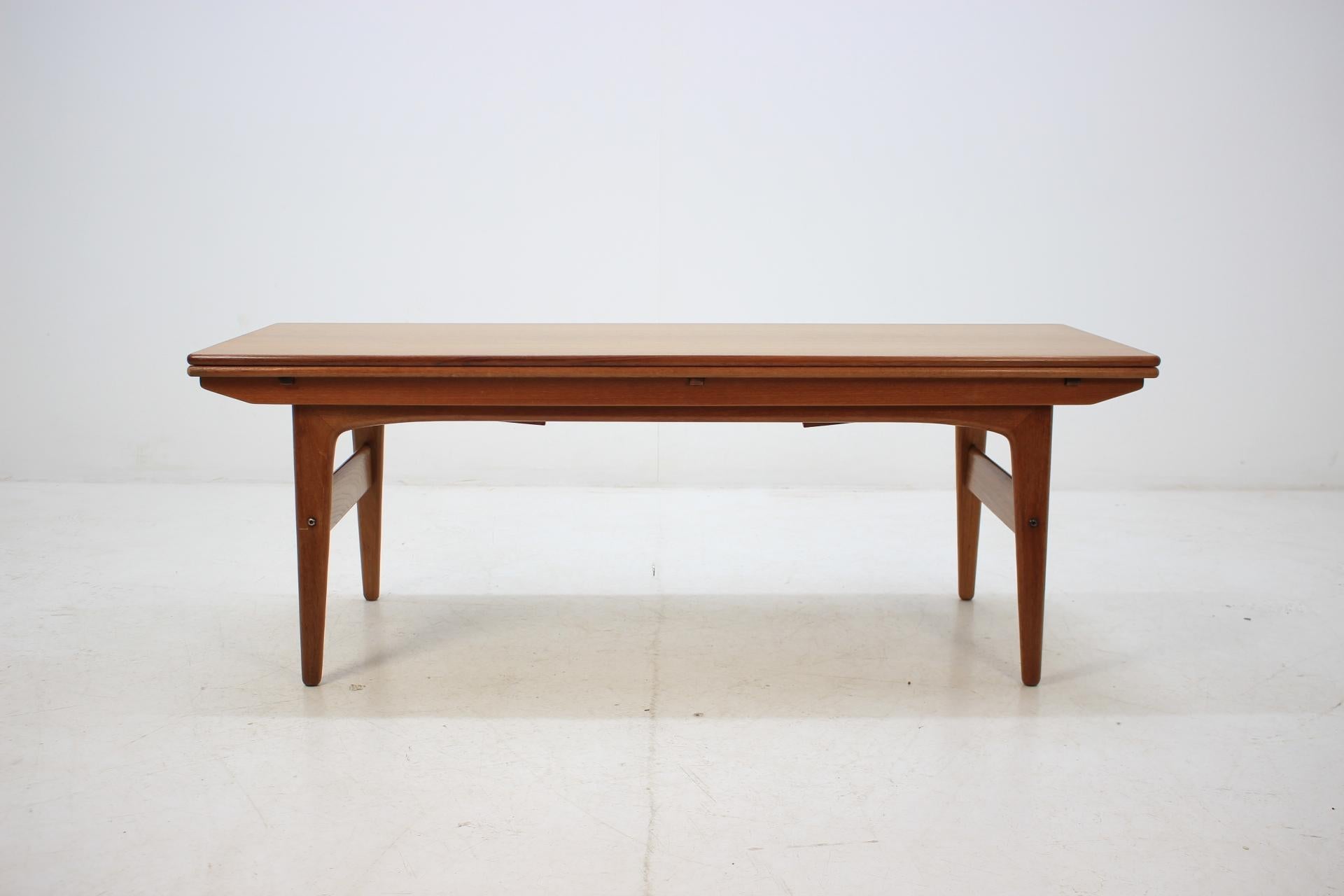 This space saving piece can be raised and also used as a small dining table. Can be raised to 73 cm and expand to 91 cm. This item was carefully restored.