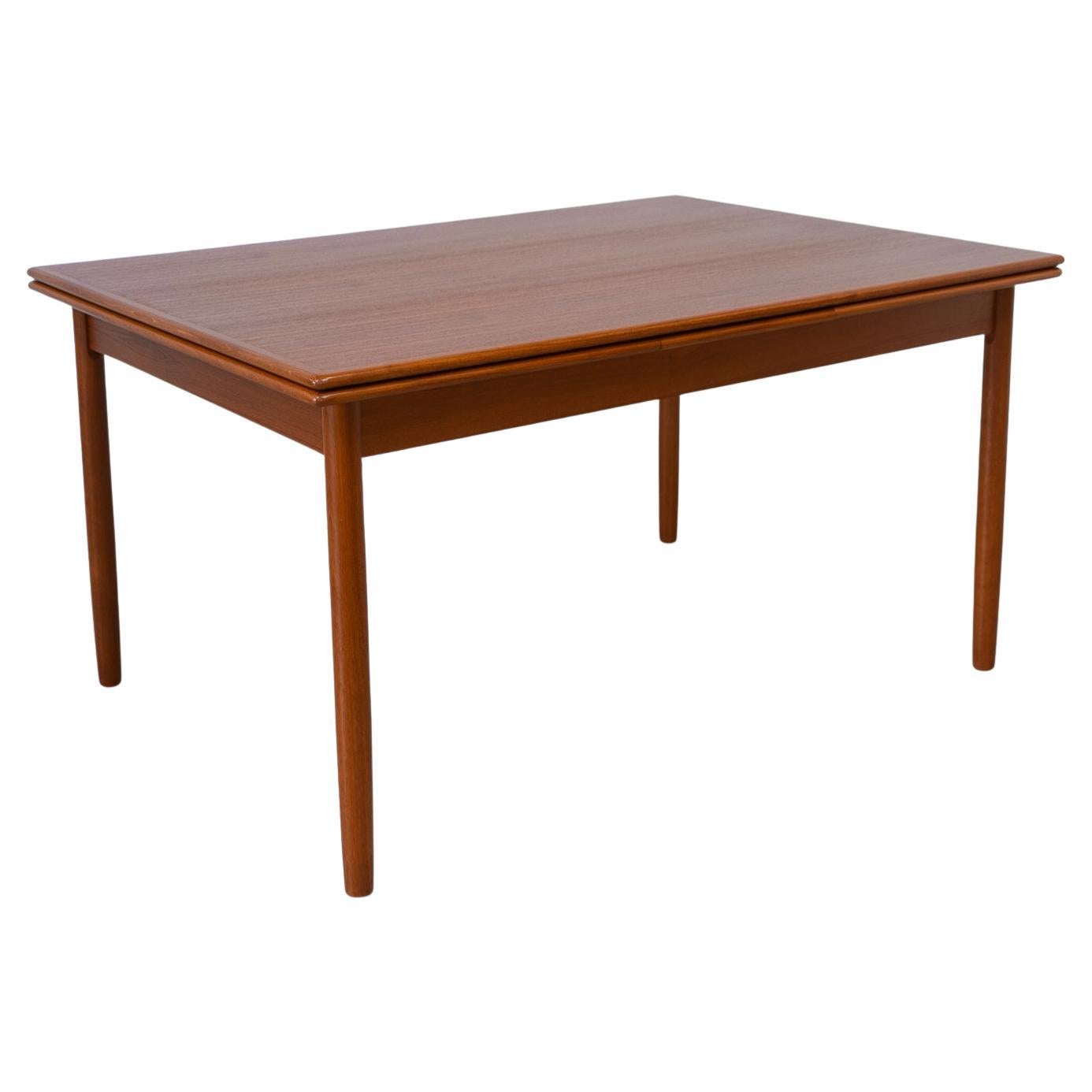 Dänischer ausziehbarer Teak-Esstisch aus der Jahrhundertmitte, 1960er Jahre.
