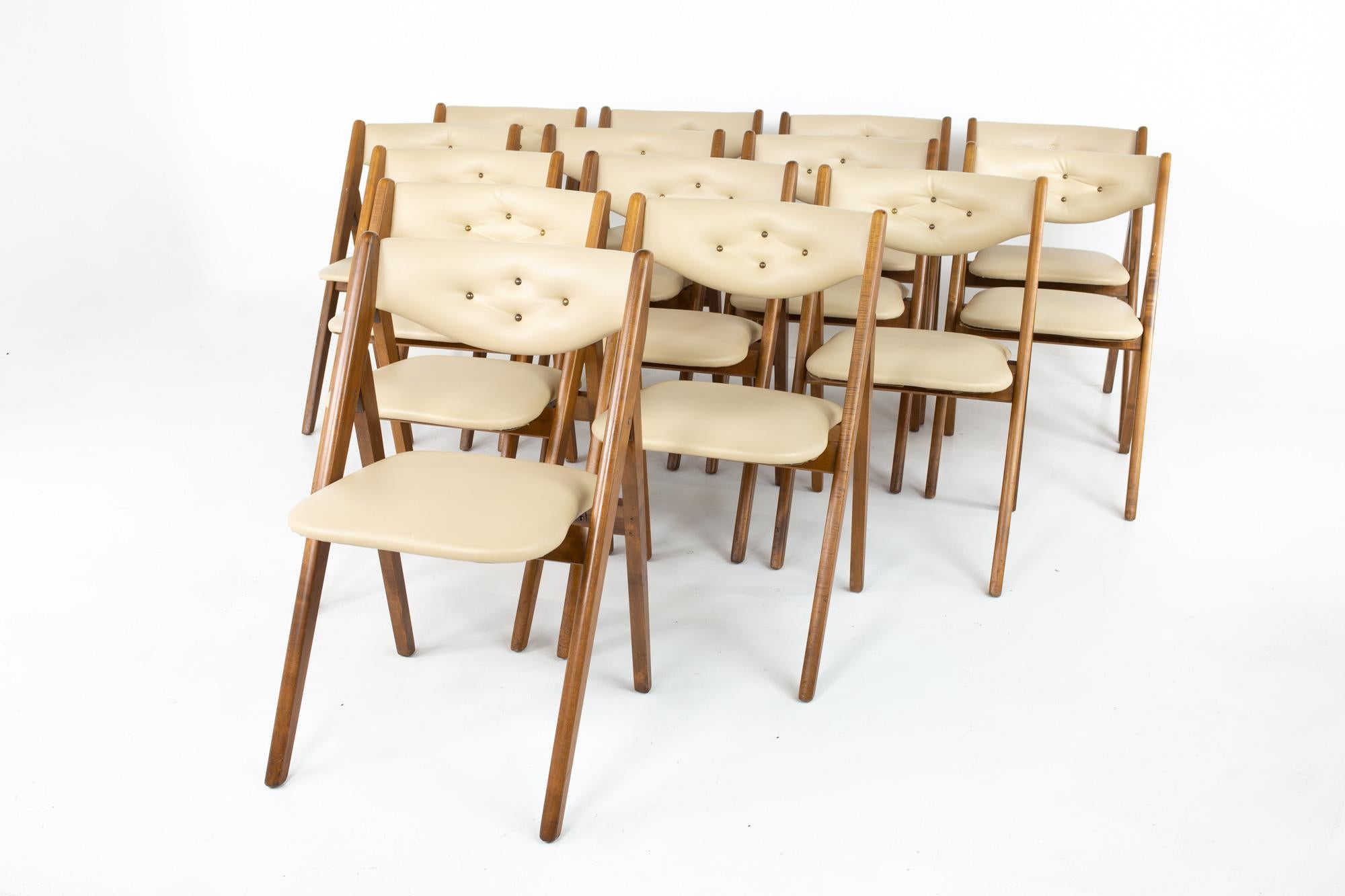 Danish mid century folding dining chairs - set of 14
Each chair measures: 19 wide x 20.5 deep x 30.5 high, with a seat height of 17.5 inches

All pieces of furniture can be had in what we call restored vintage condition. That means the piece is