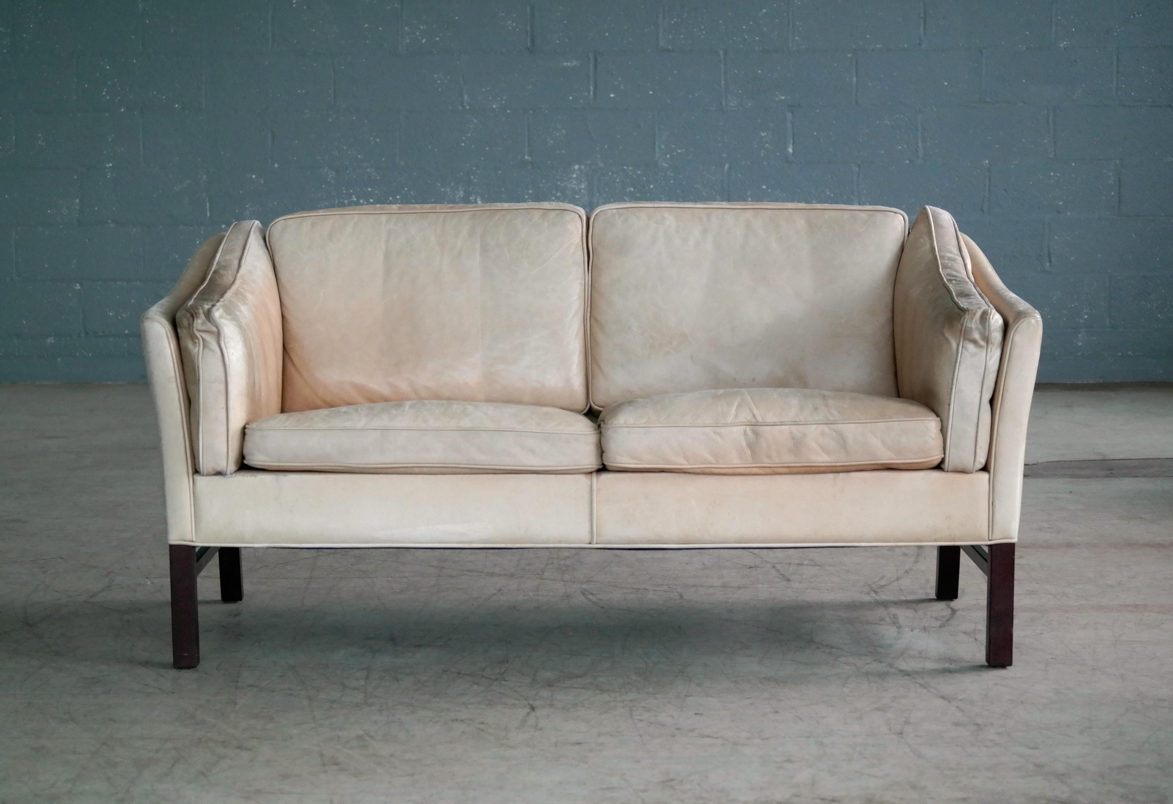Danish Midcentury Illum Wikkelso Attributed, Two-Seat Sofa in Worn Tan Leather In Good Condition In Bridgeport, CT