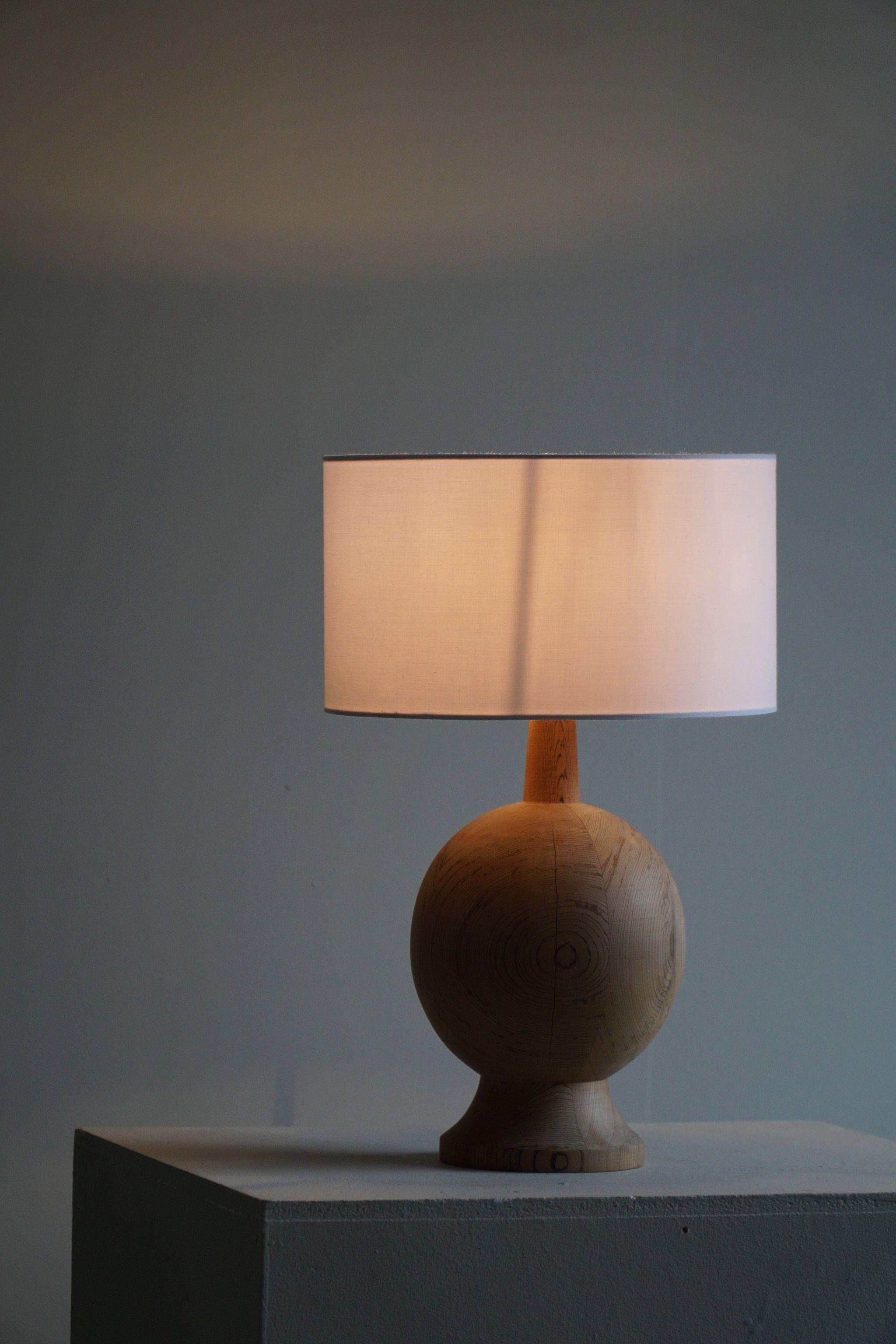 Danish Mid Century Modern, A Round Wooden Table Lamp in Solid Pine, 1960s For Sale 1