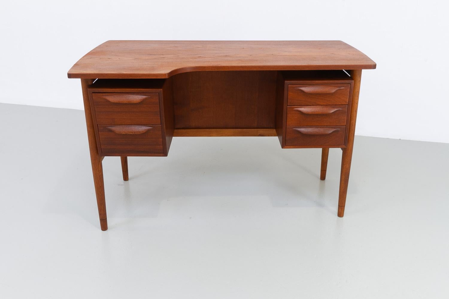 Mid-20th Century Danish Mid-Century Modern Asymmetrical Teak Desk, 1950s. For Sale