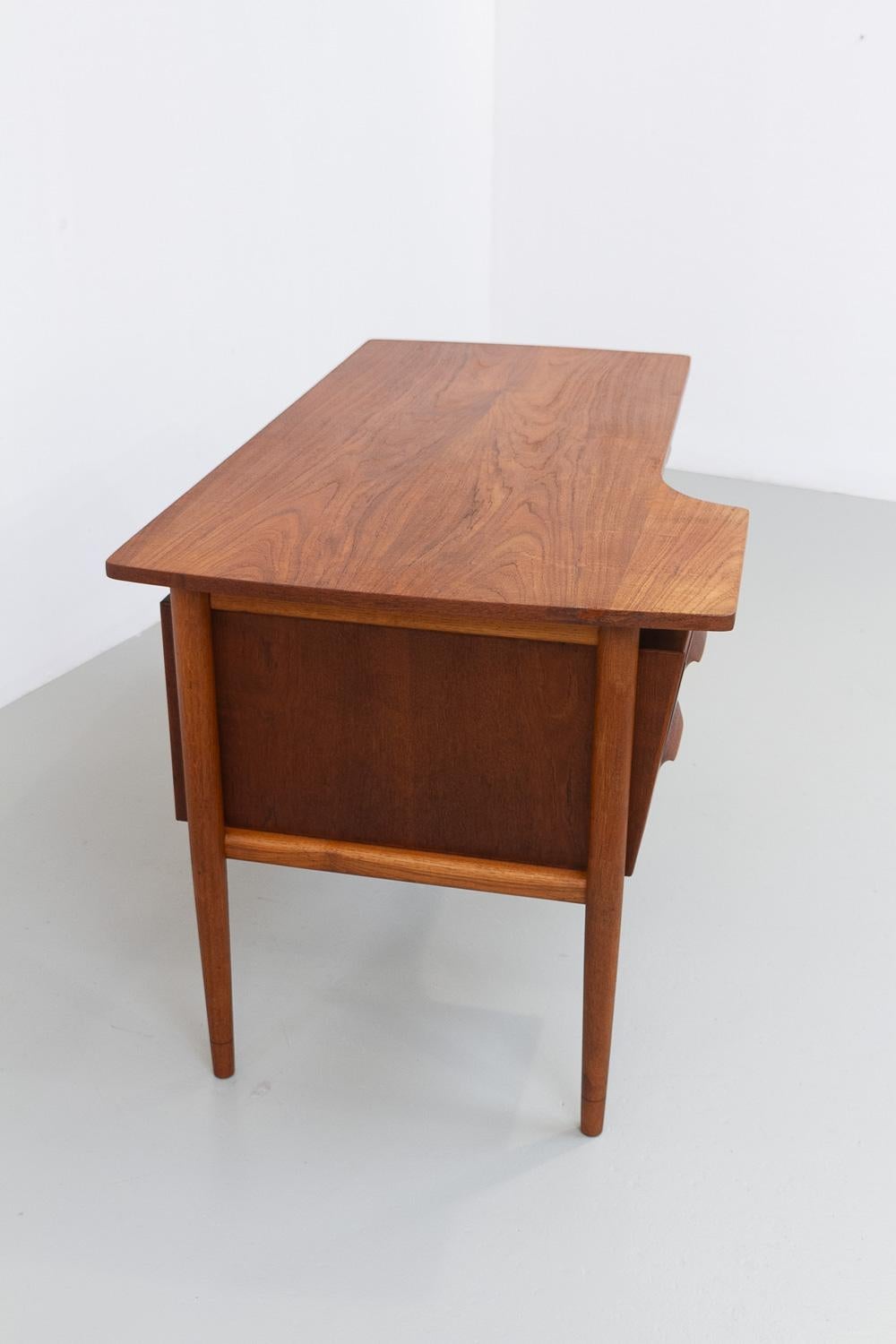 Oak Danish Mid-Century Modern Asymmetrical Teak Desk, 1950s. For Sale