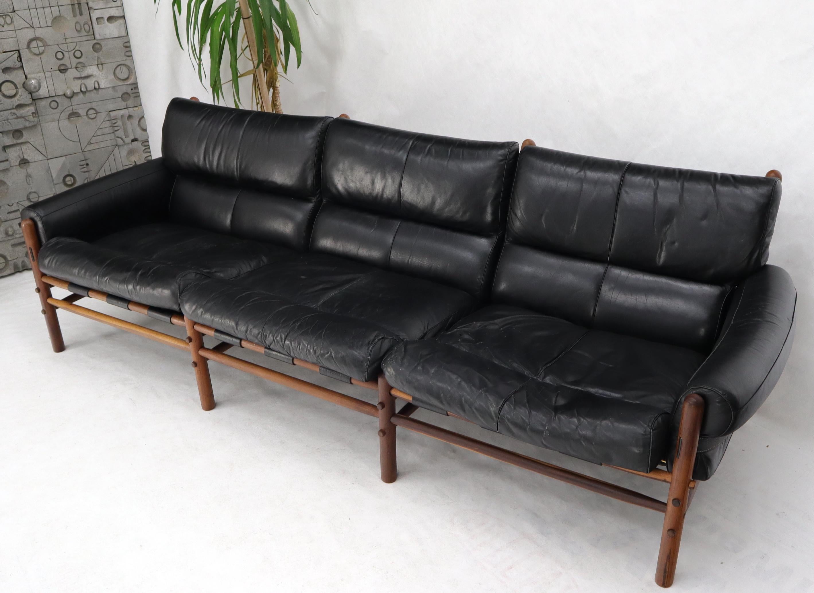 black leather couch mid century