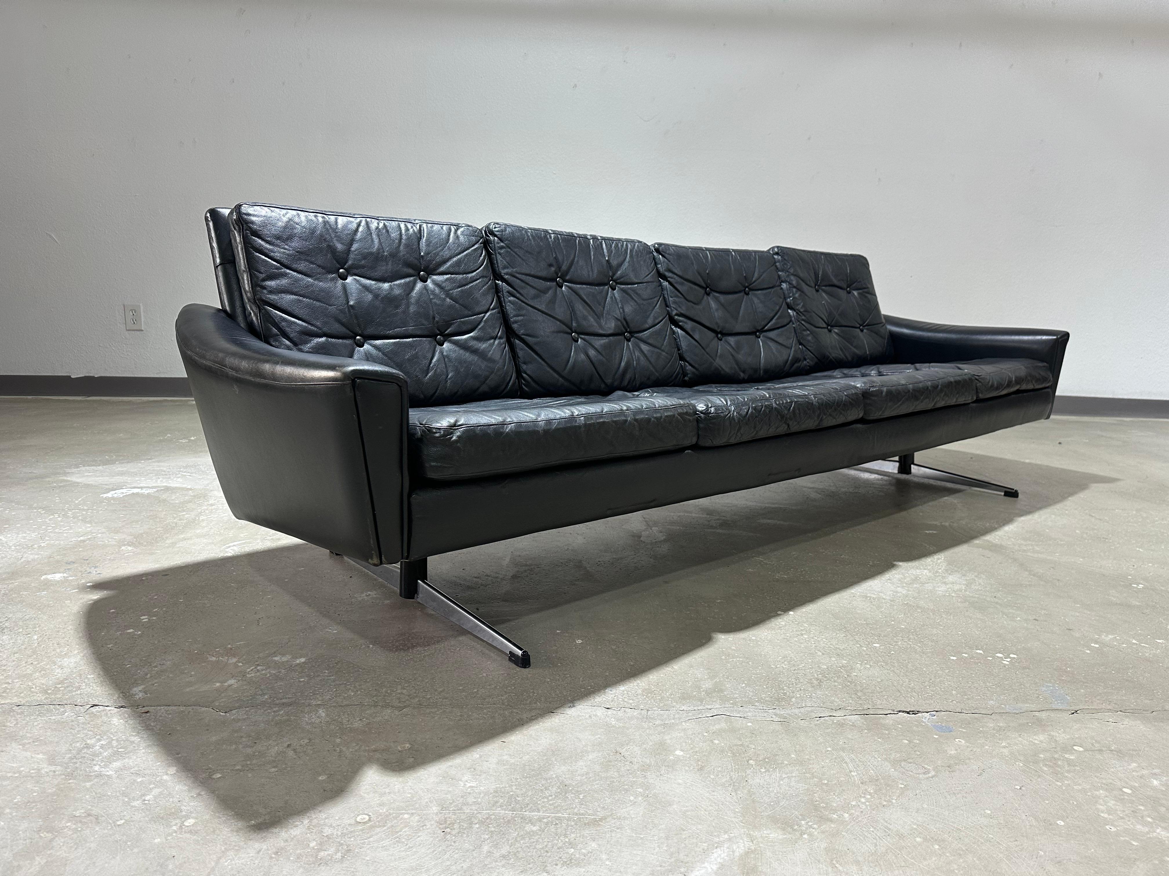 Long and sleek black leather four seater Danish Modern Mid Century sofa on chrome legs circa 1960’s. Perfectly aged and Patinated with plenty of room for guests or lounging, medium seat firmness. Dimensions: 97”L x 30”D x 28”H
SH/SD 15” x