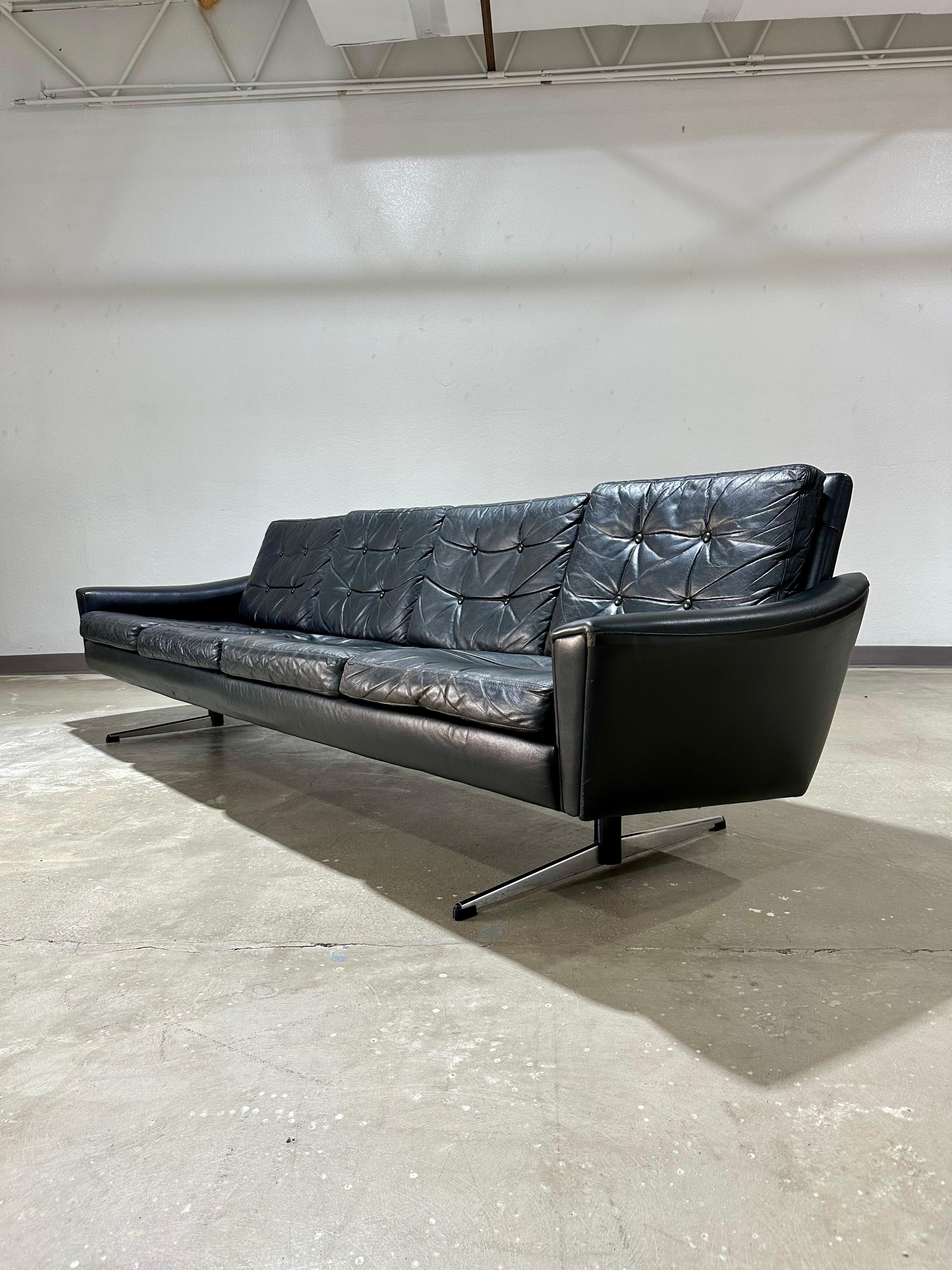Mid-Century Modern Danish Mid Century Modern Black Leather Four Seat Sofa For Sale