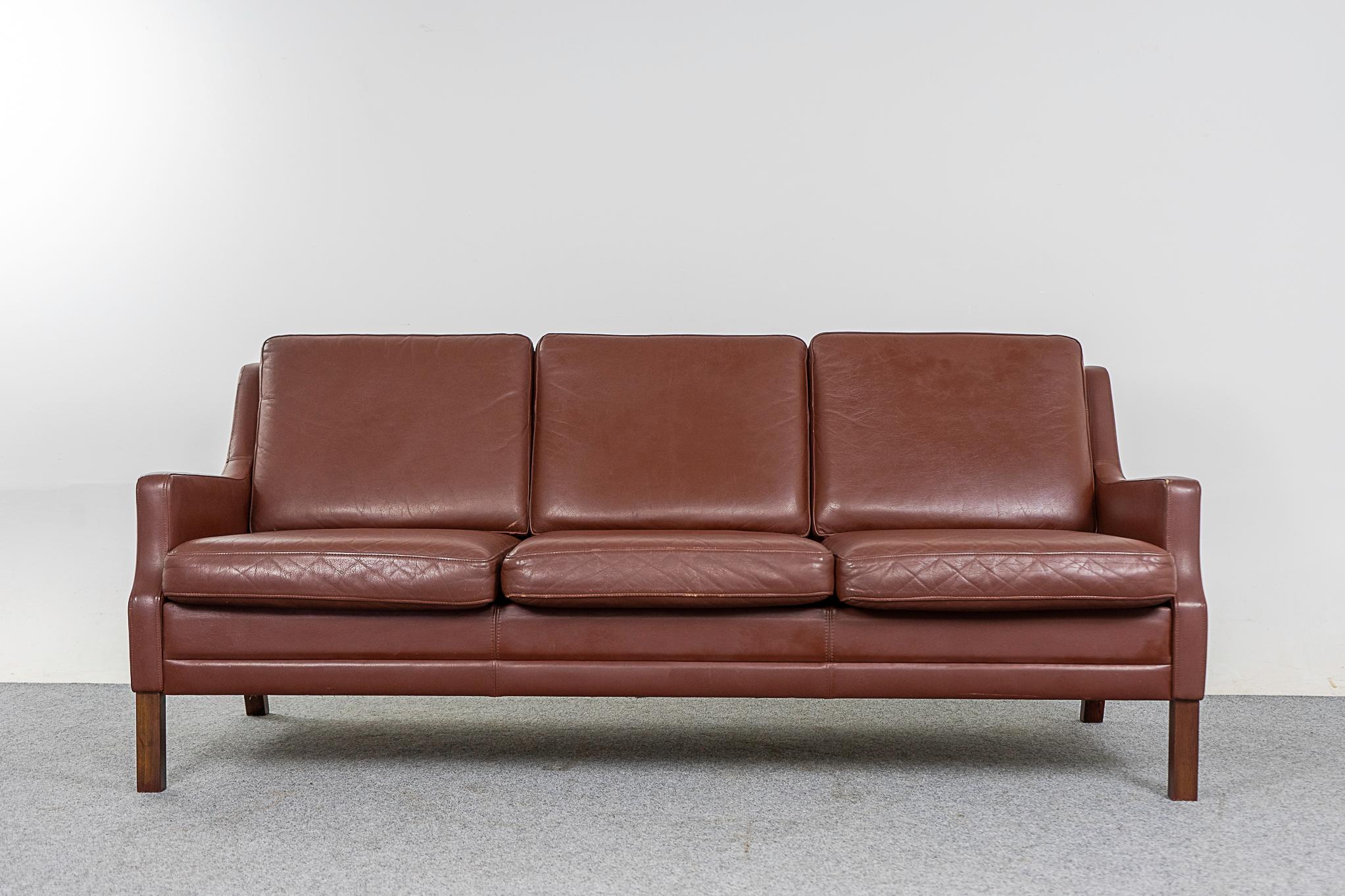 Leather Danish sofa, circa 1960's. Classic mid-century design, original brown leather is soft and supple while also being durable to ensure years of use and enjoyment!

Please inquire for remote and international shipping rates.