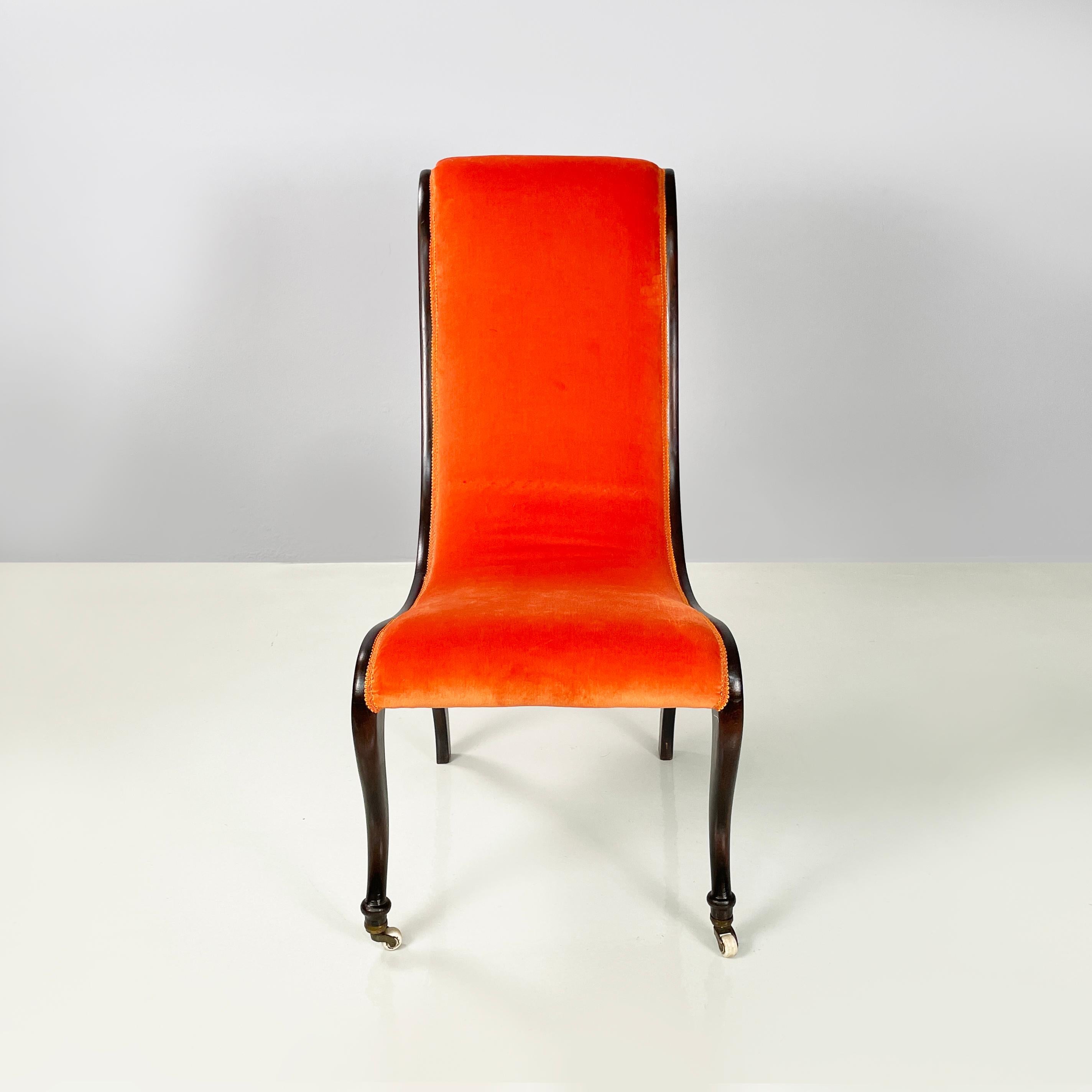 Danish mid-century modern Chair in orange velvet and dark wood, 1950s
Chair with curved back and seat, padded and covered in bright orange velvet fabric. The edges are finished with orange trimmings. The structure that follows the curve of the seat