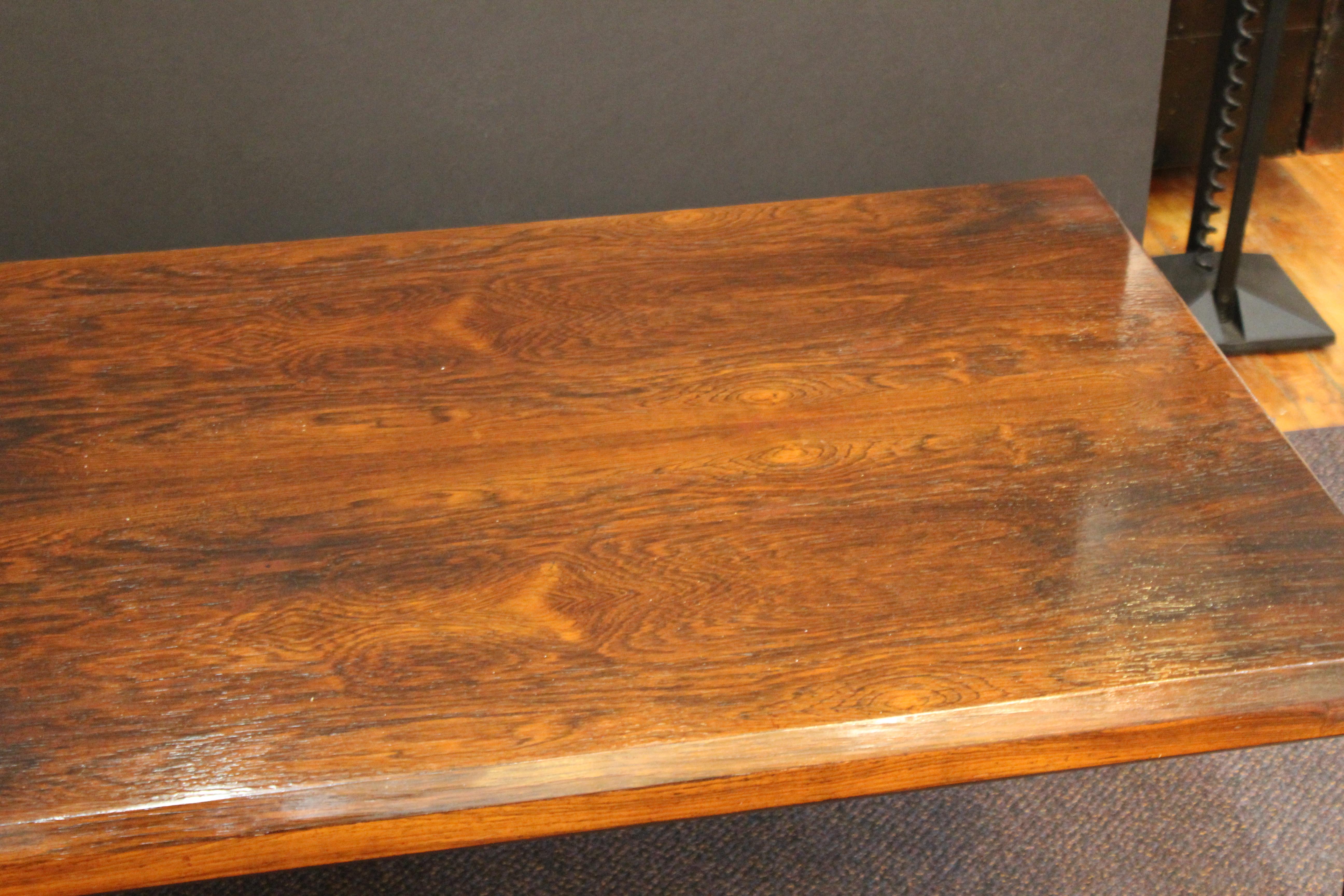 Danish Mid-Century Modern wood coffee table or cocktail table made in the mid-20th century. The piece has a label from the Danish Furniture Makers quality control on the bottom and is in great vintage condition with very minor wear to the bottom