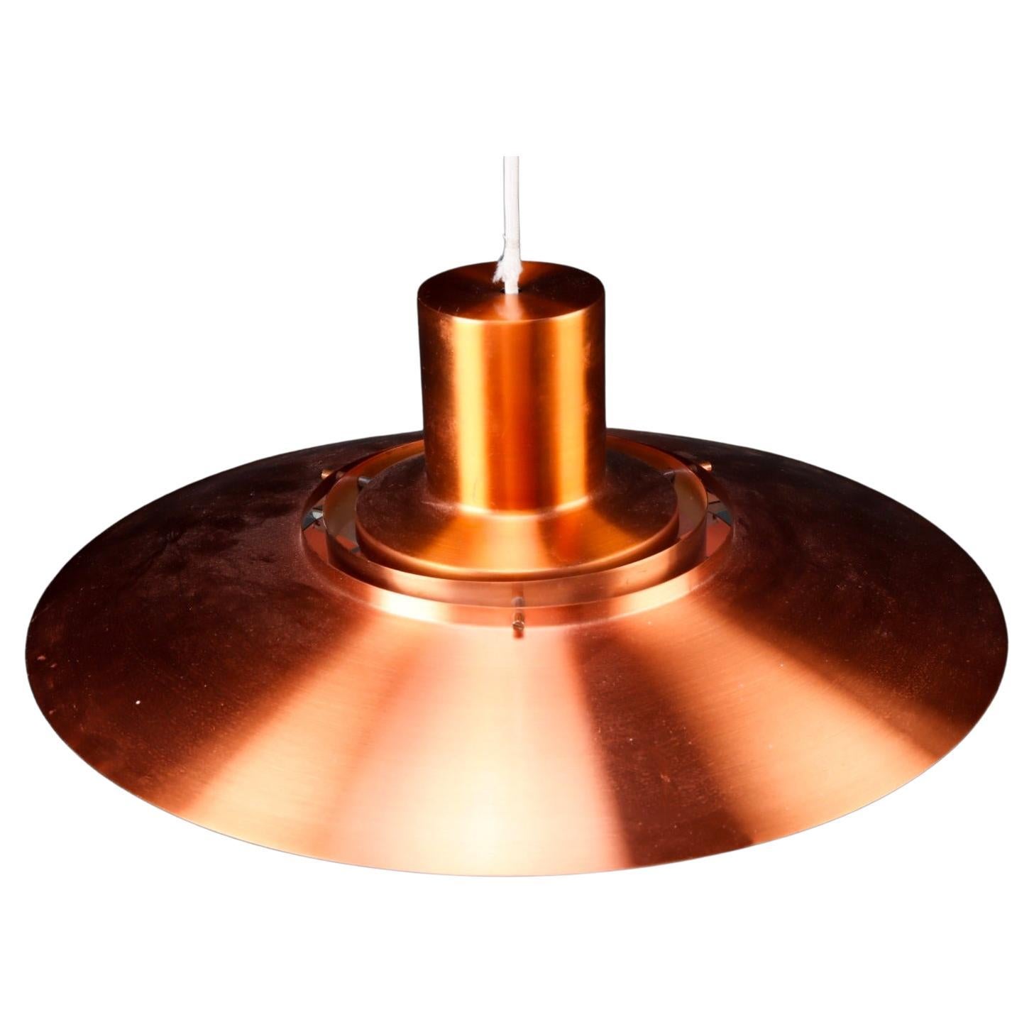 Scandinavian Modern pendant in copper designed by Preben Fabricius & Jørgen Kastholm. Model 376, designed for and produced by Nordisk Solar in Denmark 1963. This classic Danish Design lamp will complement many interior styles. A modern, antique,