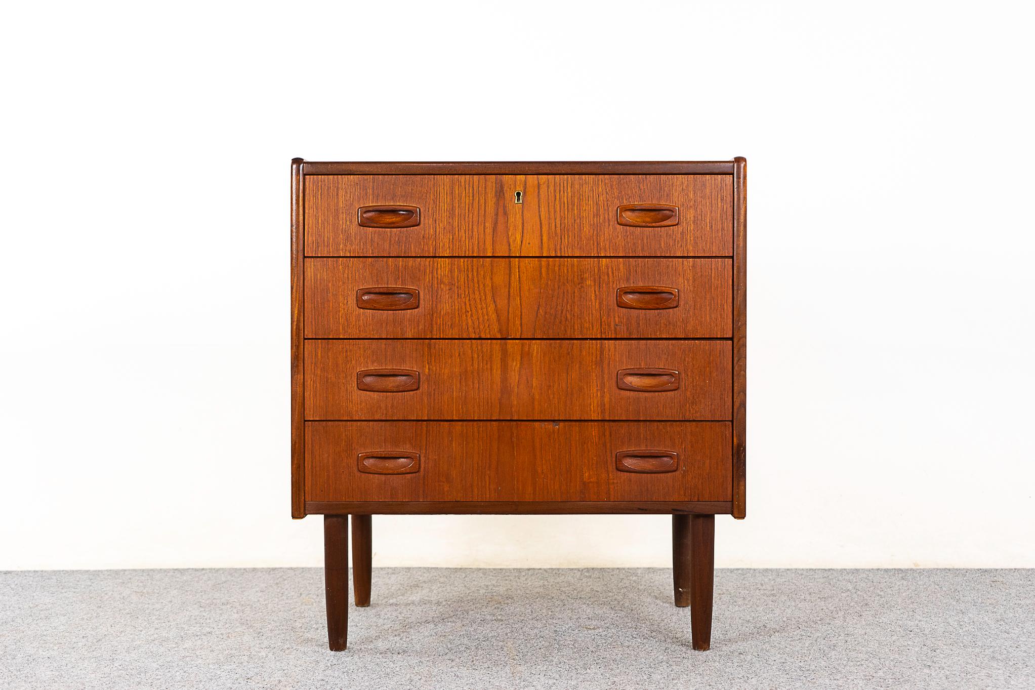 Teak Danish dresser, circa 1960's. Stunning book-matched veneer drawer faces. Sleek handles, dovetail construction and tapering legs.  

Please inquire for remote and international shipping.