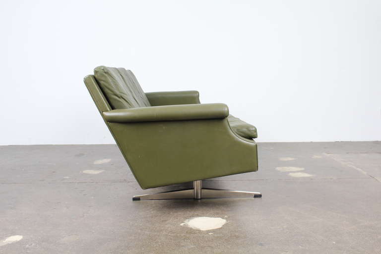 mid century green leather sofa