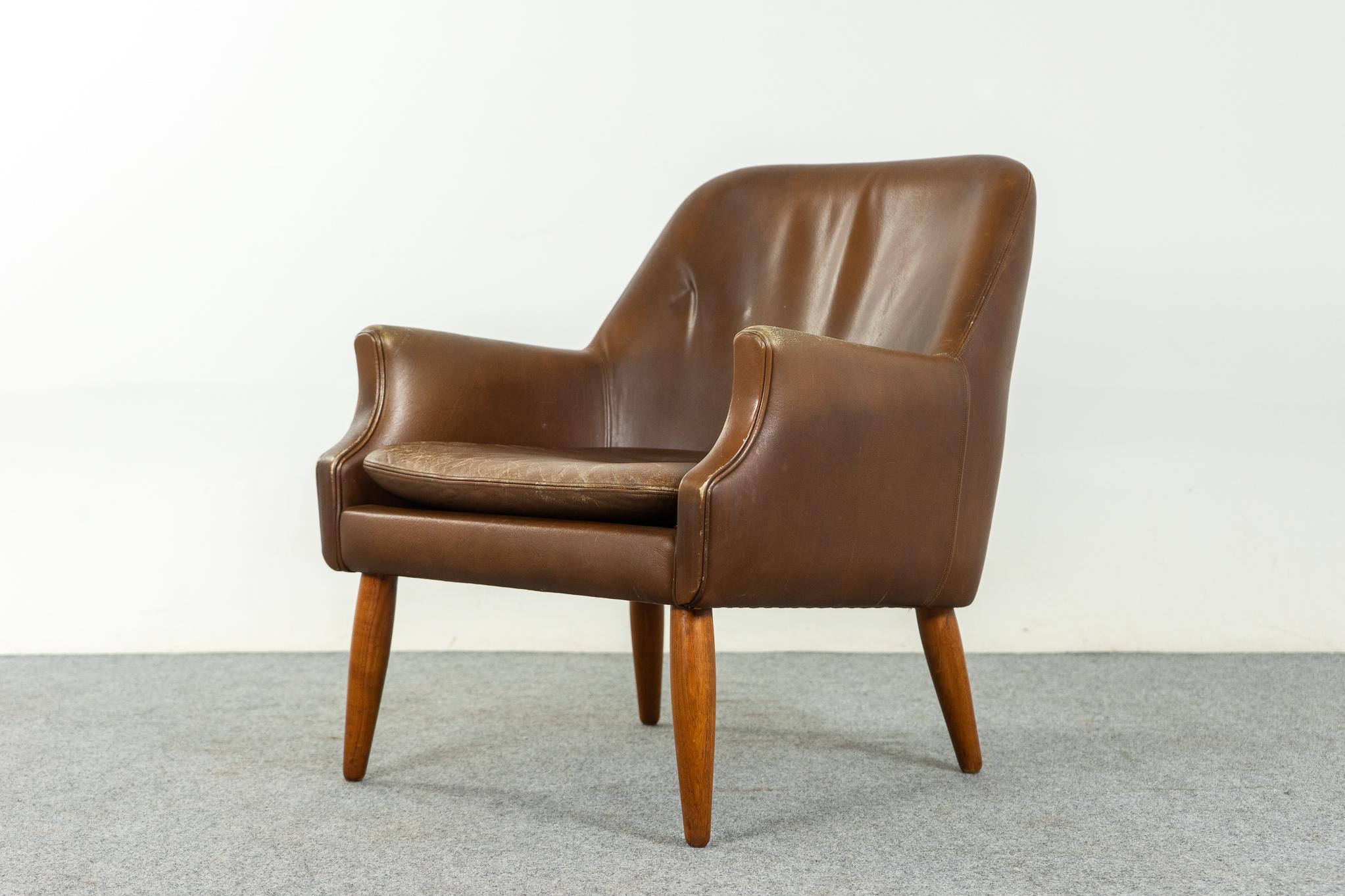 Leather & teak mid-century lounge chair, circa 1960's. Original brown leather with great patina, tapered, solid splayed teak legs!

Please inquire for international and remote shipping rates.