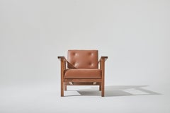 Danish Mid-Century Style Lounge Chair Walnut and Saddle Vinyl by Stille Home