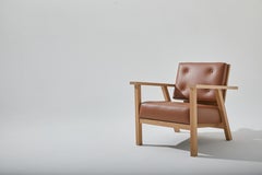 Danish Mid-Century Modern Lounge Chair White Oak and Saddle Vinyl by Stille Home