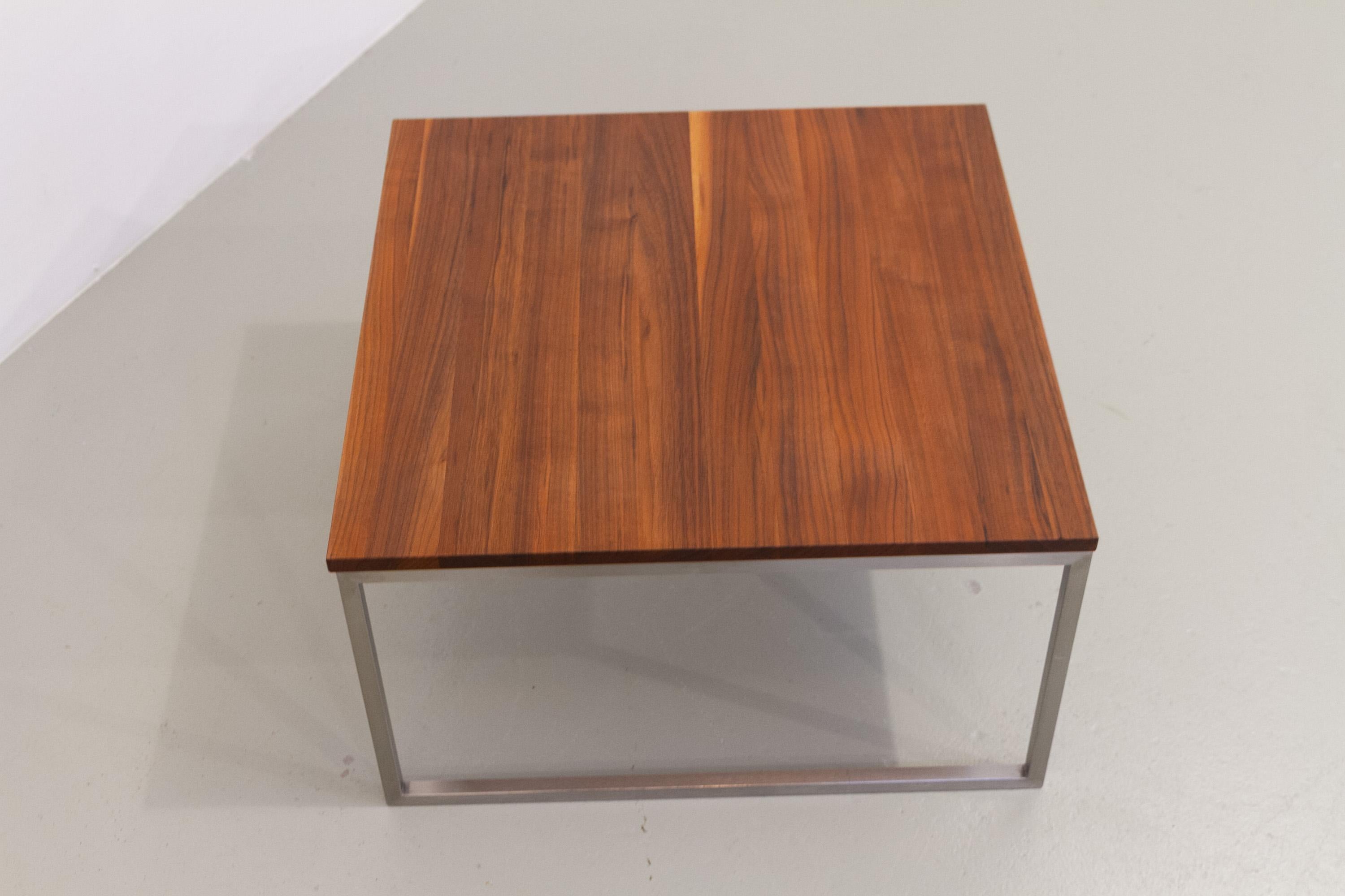 Danish Mid-Century Modern Lounge Table in Solid Teak and Steel, 1960s.

Minimalistic Scandinavian Mid-Century Modern lounge table with beautiful variation of all teak colors on the solid tabletop. Frame in brushed stainless steel.

Designed and