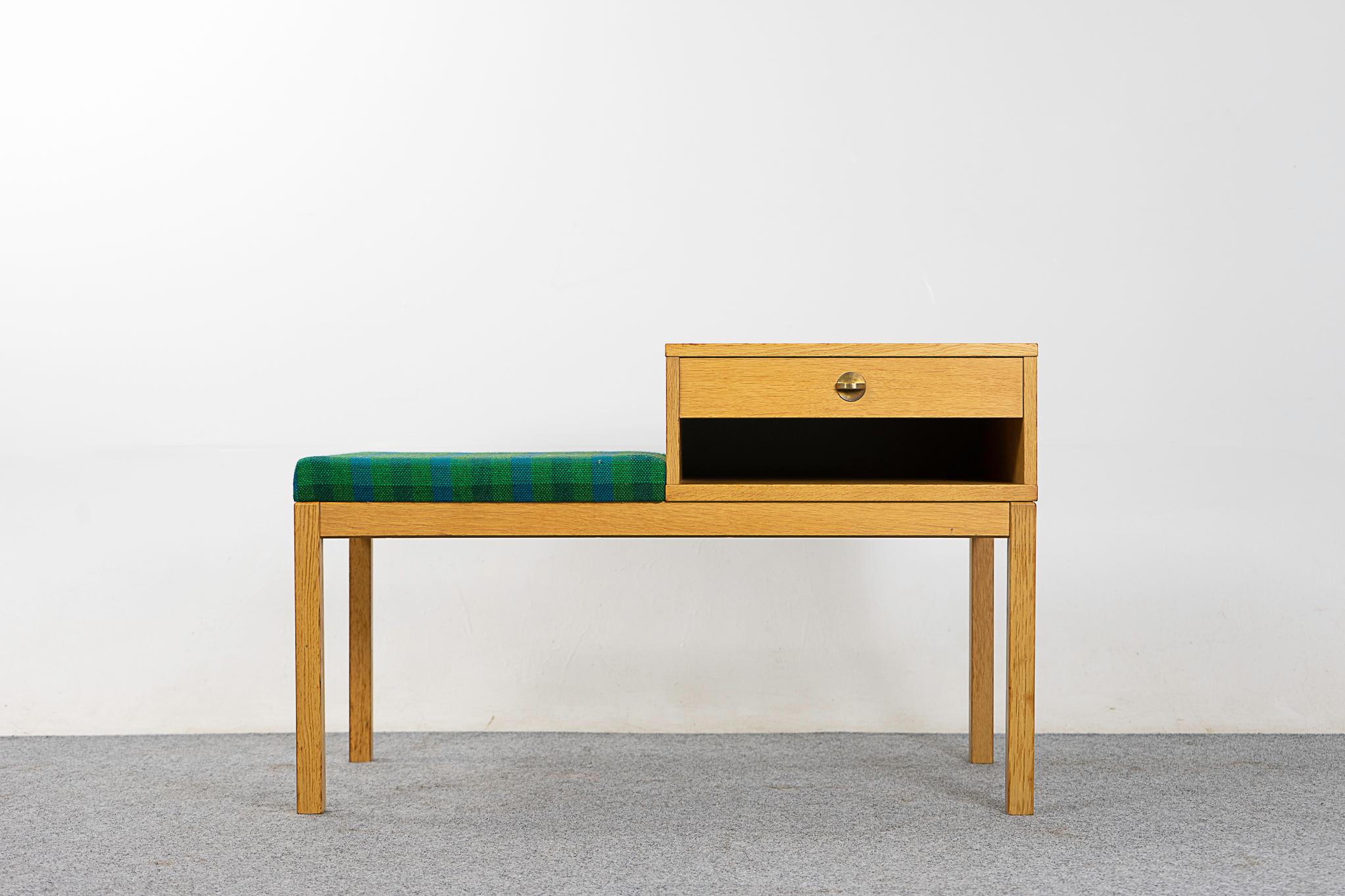Oak midcentury bench, circa 1960s. A perfect entryway seating solution! Dovetailed drawer with darling metal finger pull, open cubby for gloves etc. Vibrant original upholstery with repair on back corner. Easy to reupholster if you wish to