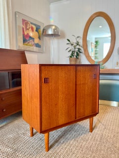 Danish mid century modern record cabinet with a sliding door, circa 1960s