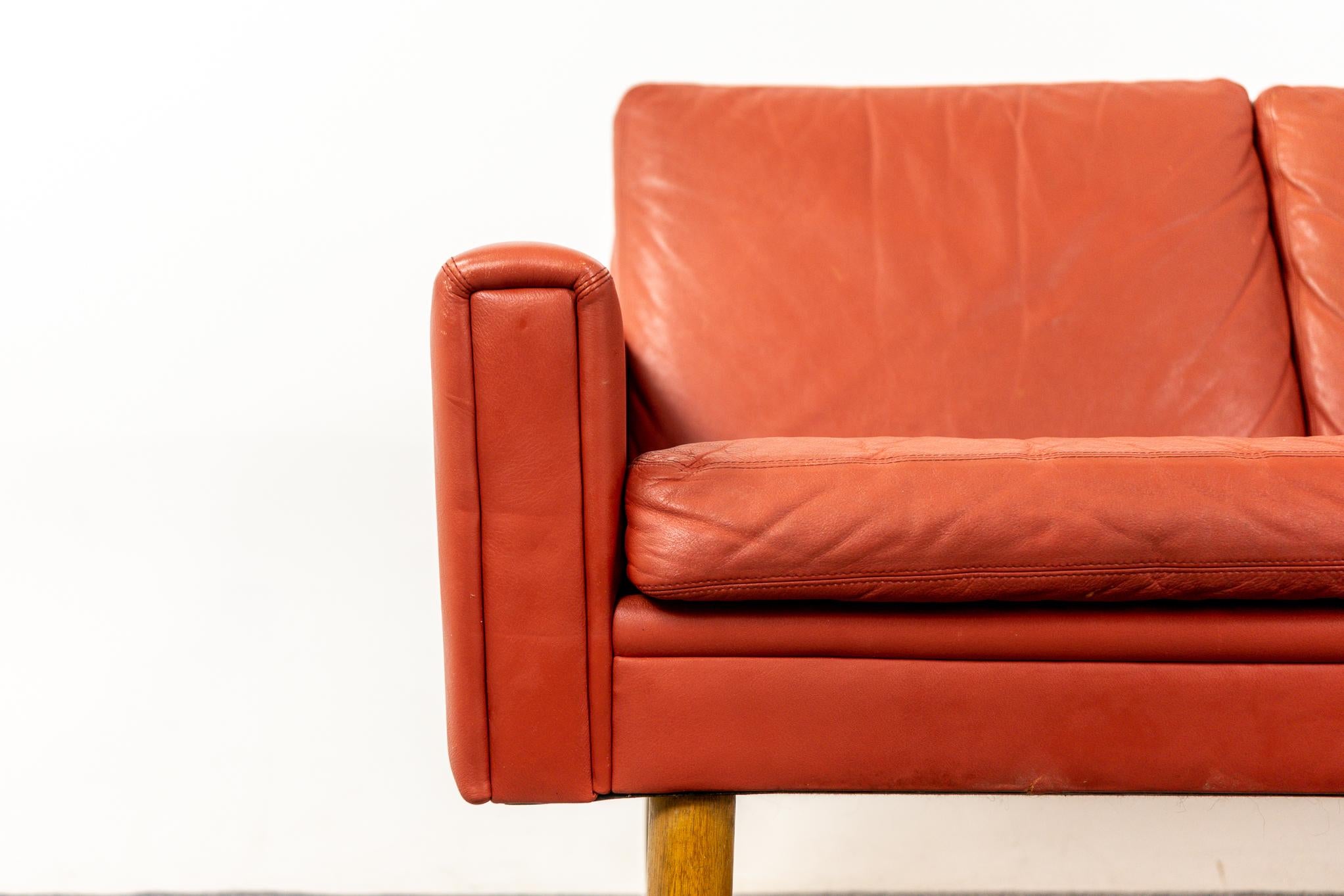 Scandinavian Modern Danish Mid-Century Modern Red Leather Three Seat Sofa with Oak Legs